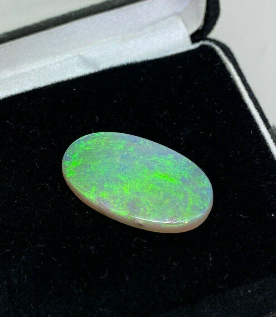 Magnificent Loose Australian Jelly Opal

of Cabochon Cut
of oval shape
of 10.32ct (26 x 14 x 4mm)

exhibiting great play of colours (blue, green, yellow)

Valued at $10,000.
