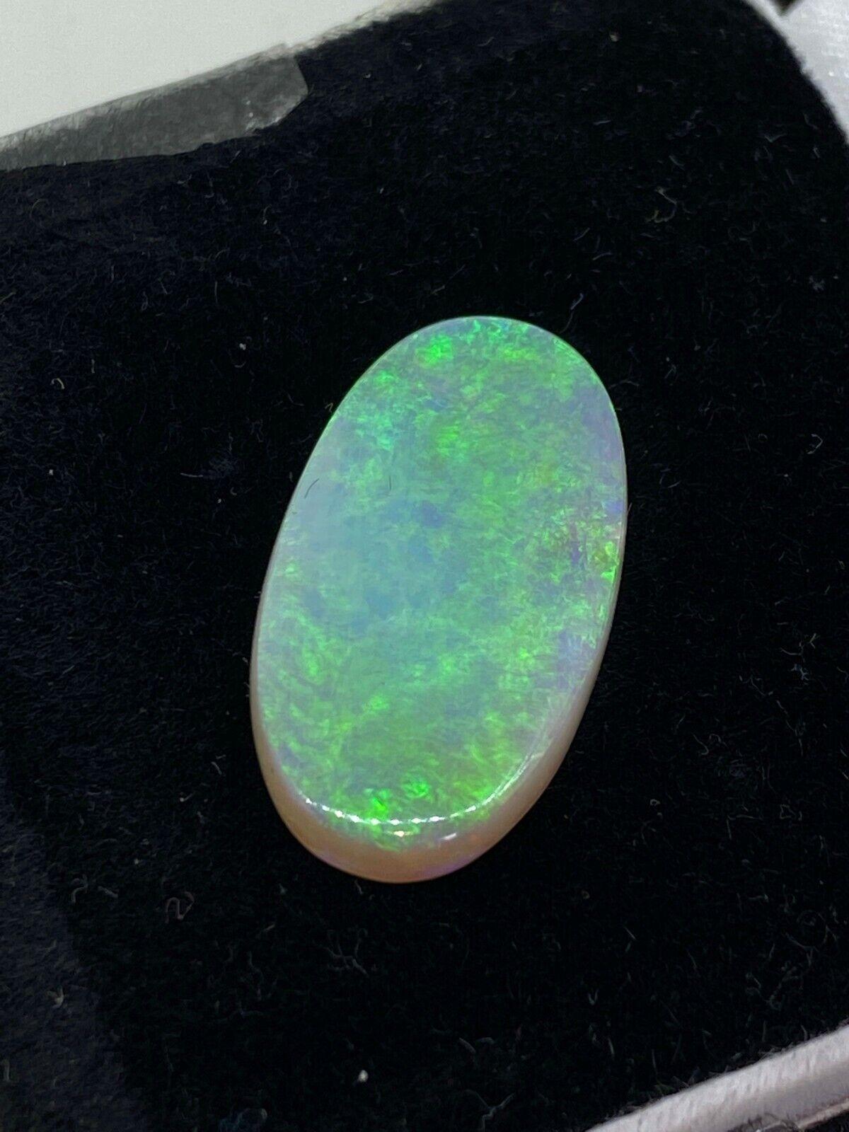 10.32ct Oval Cabochon Cut Loose Australian Opal. Valued at $10000. In Excellent Condition For Sale In MELBOURNE, AU