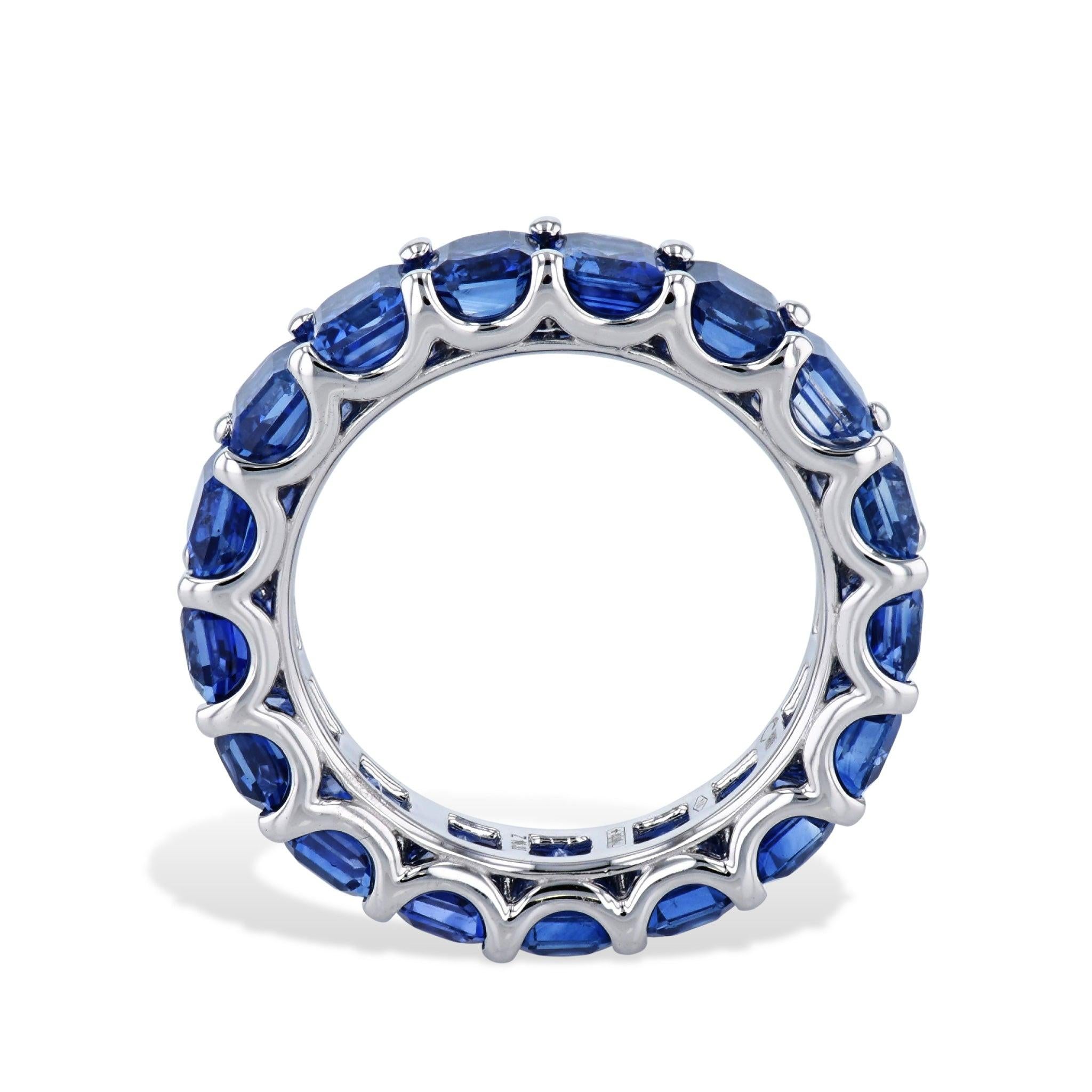 Vibrant blue sapphires light up this stunning eternity band with 18K white gold. 
Celebrate your special moments with this dazzling band. 

Size 6.5.
Sapphire White Gold Eternity Band.
Blue Sapphires:  10.33ct TW.
18kt. White Gold.
Eternity band. 
