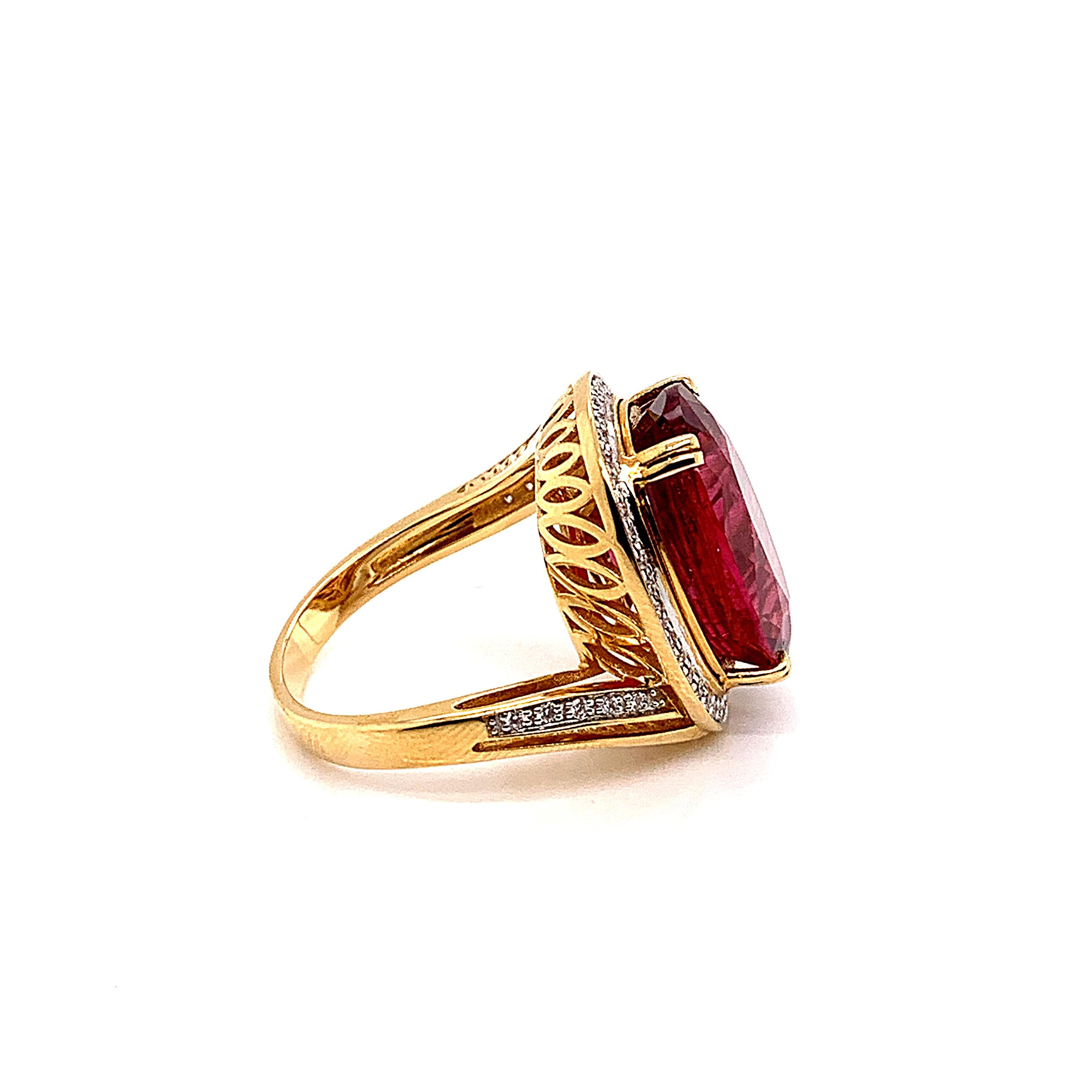 Oval Cut 10.34 Carat Oval Shaped Rubelite Ring in 18 Karat Yellow Gold with Diamonds For Sale