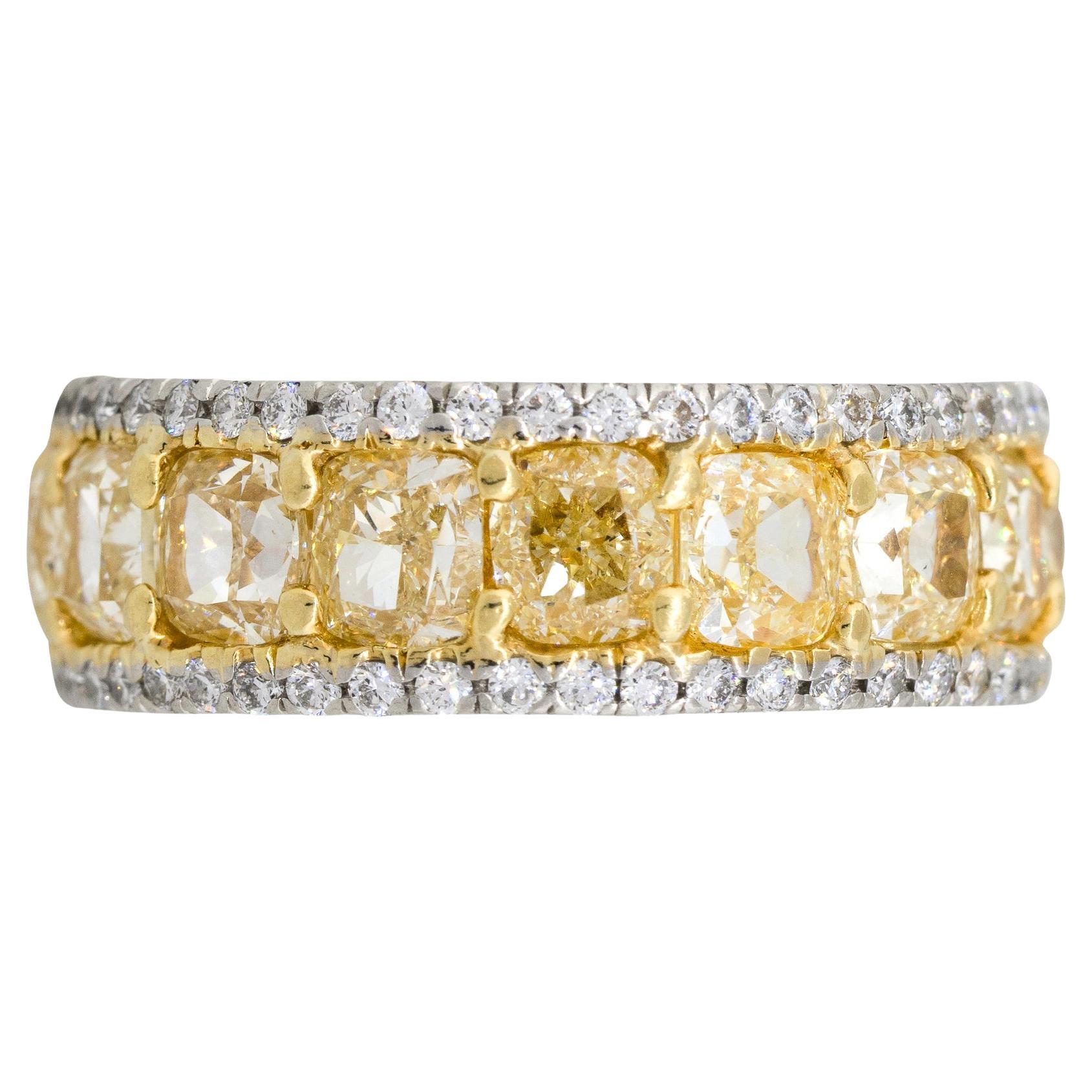 Two Tone 10.34ctw Radiant & Round Brilliant Diamond Eternity Band

Material: Platinum & 18k Yellow Gold
Center Row Diamond Details: Approximately 7.86ctw of Radiant Cut Diamonds. Diamonds are Fancy Yellow in Color and approximately VS in