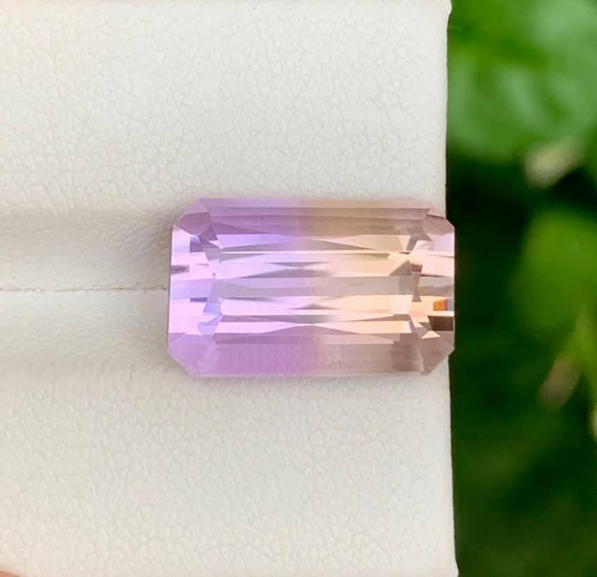 Weight 10.35 carat 
Dimensions 15.9x9.9x8.8mm
Treatment None
Origin Bolivia 
Clarity Loupe Clean
Shape Cut Emerald 



The 10.35 Carat Natural Loose Ametrine Gemstone showcases a stunning harmony of colors, blending golden Citrine with rich Purple