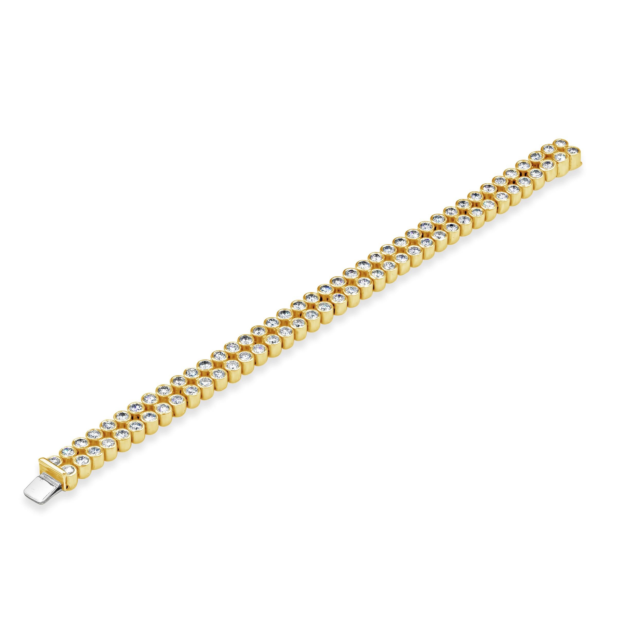 A versatile piece of jewelry perfect for everyday use showcasing two rows of round brilliant diamonds, bezel set in 18K yellow gold. Diamonds weigh 10.37 carats total. Finely made in 18K yellow gold and 7 inches in length.

Roman Malakov is a custom