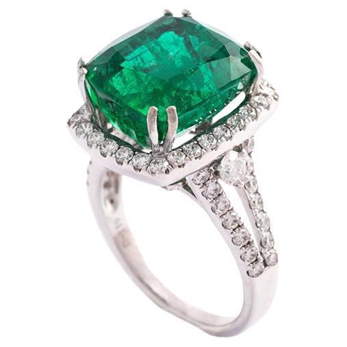 10.38 carat Natural Zambian Emerald Minor Oil mounted on a Diamond pave white gold Ring.
Accompanied by a Grs Swiss Laboratory Certificate.