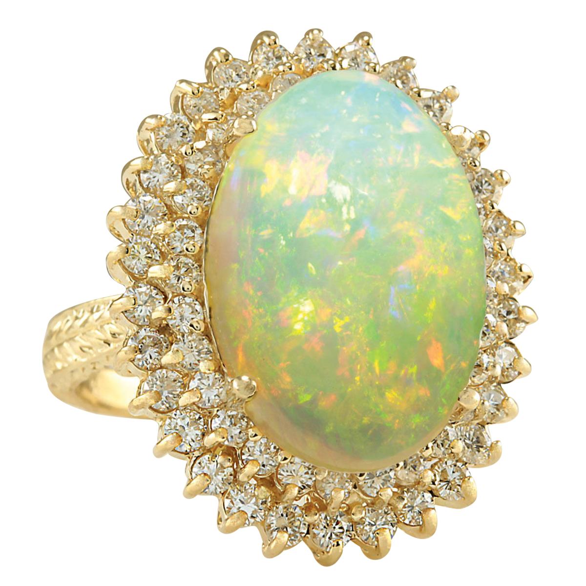 Stamped: 14K Yellow Gold
Total Ring Weight: 10.5 Grams
Total Natural Opal Weight is 8.78 Carat (Measures: 18.00x13.00 mm)
Color: Multicolor
Total Natural Diamond Weight is 1.60 Carat
Color: F-G, Clarity: VS2-SI1
Face Measures: 26.55x21.25 mm
Sku: