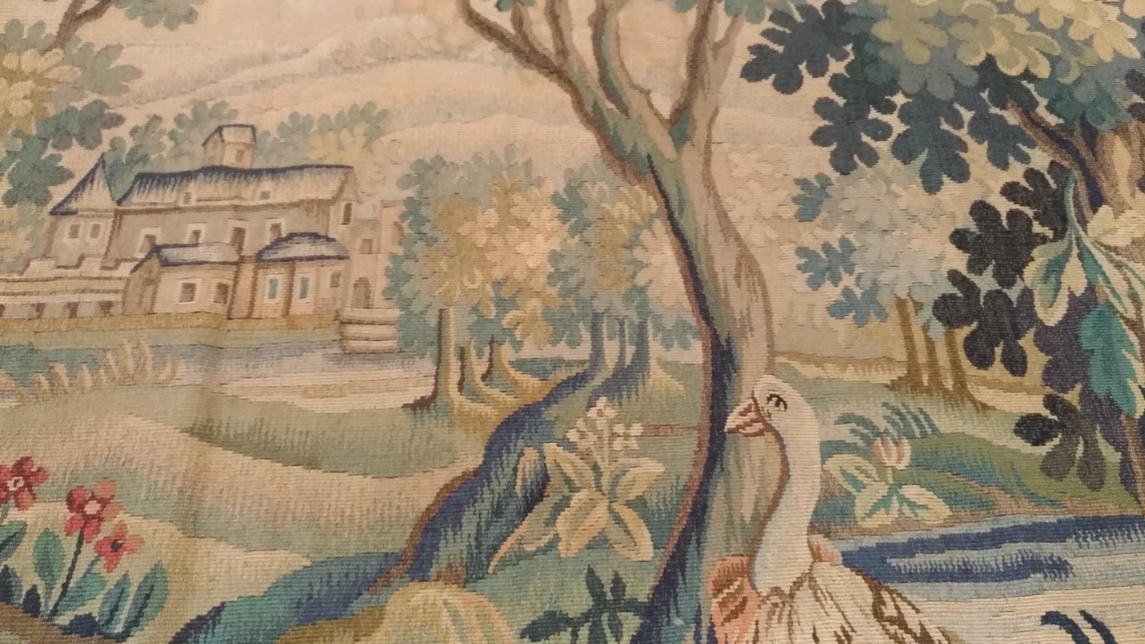 1038 - Luxurious Aubusson tapestry from the end of the 18th century with a very beautiful drawing of nature, with a very pretty river coming from the mountains. A pretty bridge, and at the top of the mountains, a castle, in pretty natural colors,