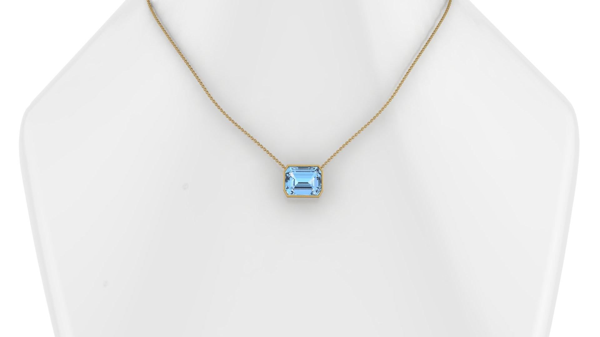 10.39 Karat Smaragdschliff Aquamarin in 18K Gold dünne Lünette Halskette Anhänger
Die Länge der Halskette kann auf 18