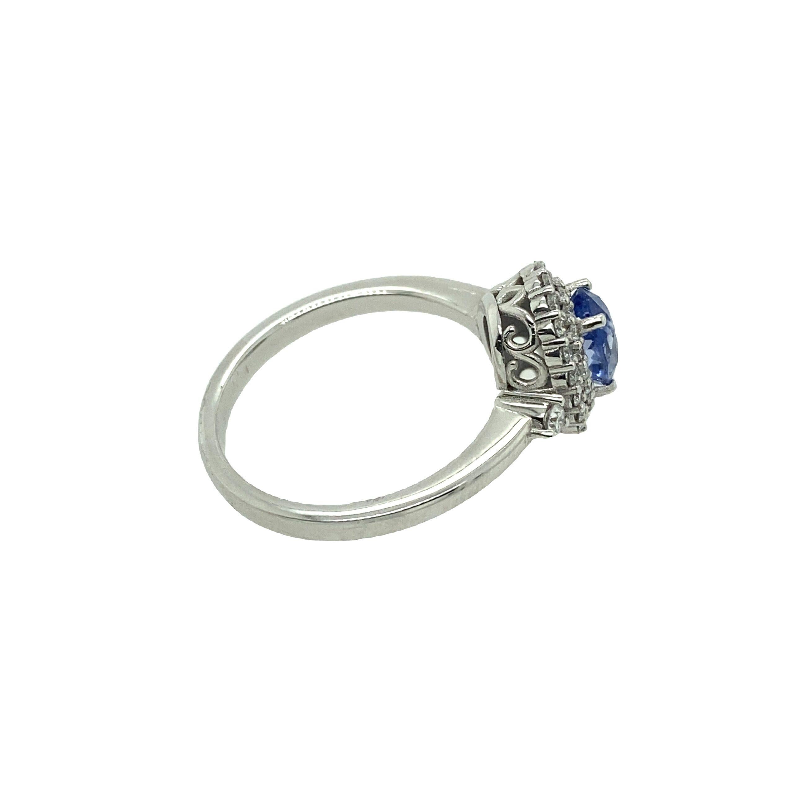 Oval Cut 1.03ct Certified Natural Ceylon Sapphire Ring Surrounded by 0.31ct Diamonds For Sale