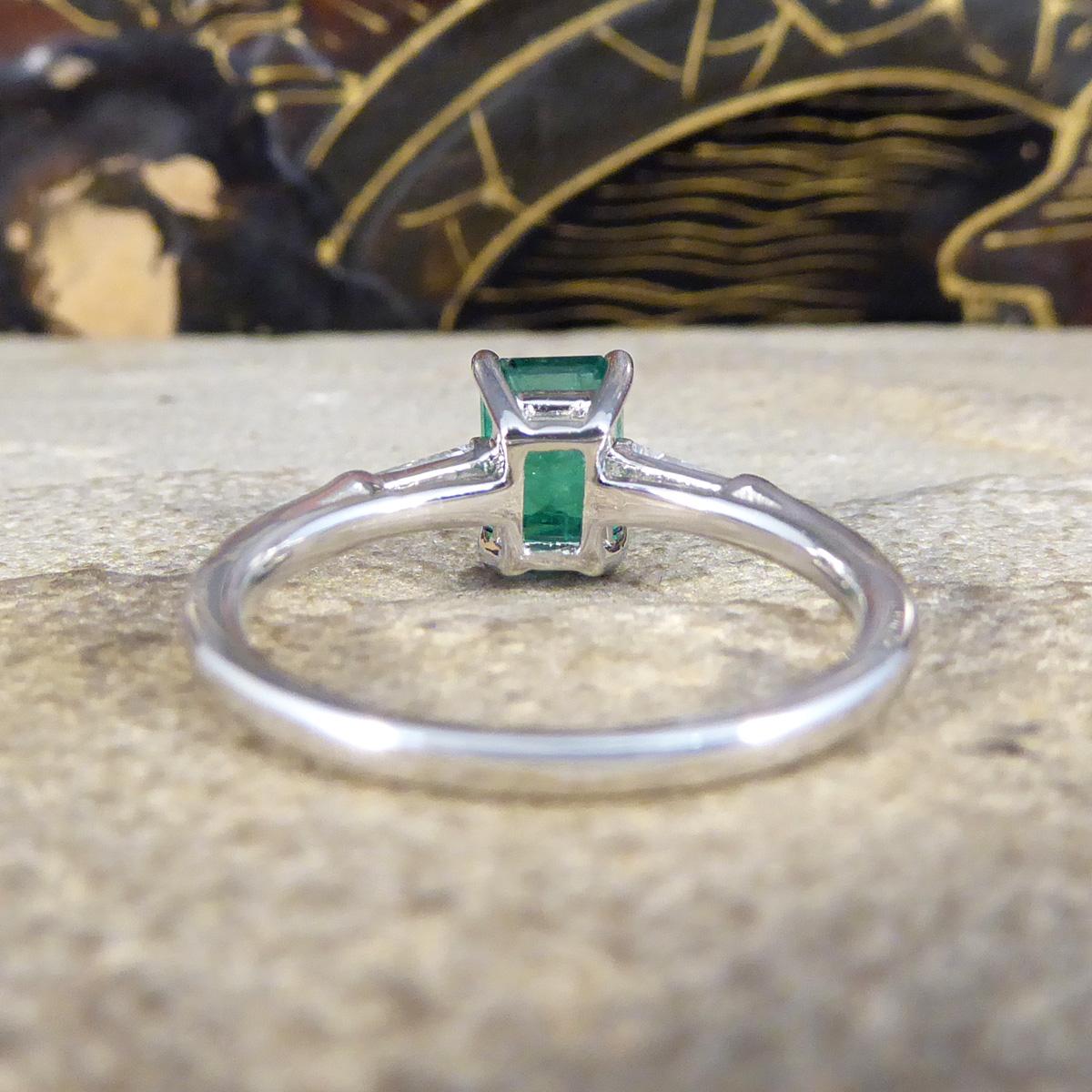 Modern 1.03ct Emerald Cut Emerald Ring with Baguette Cut Diamond Shoulders in Platinum