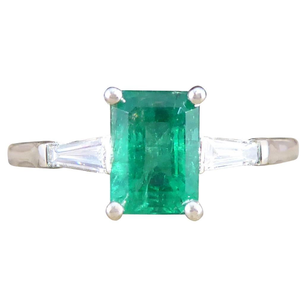 1.03ct Emerald Cut Emerald Ring with Baguette Cut Diamond Shoulders in Platinum