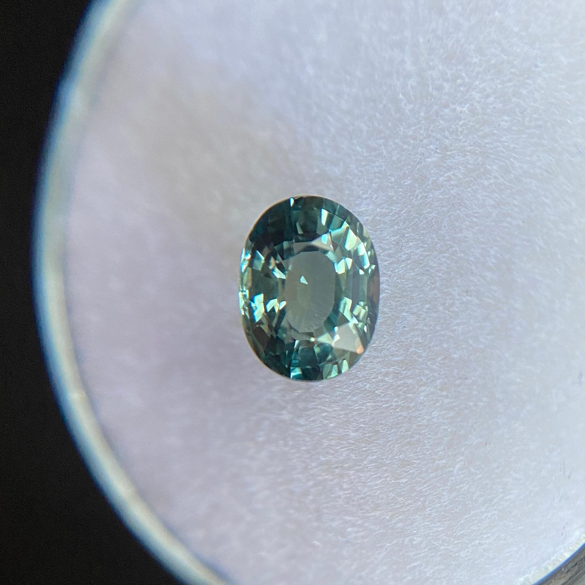 GIA Certified Fine Vivid Green Blue Untreated Sapphire Gemstone.

Fully certified by GIA confirming stone as natural and untreated. Very rare for natural sapphires.

1.03 Carat with excellent clarity, a very clean stone. It also has an excellent