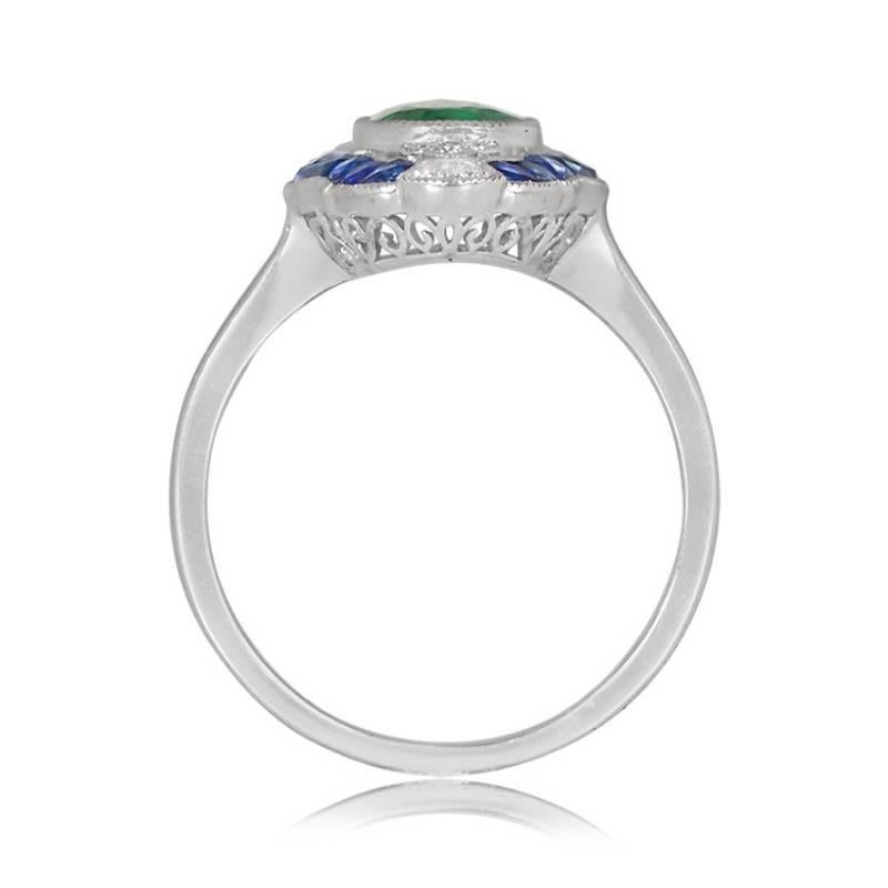 1.03ct Oval Cut Natural Emerald Cocktail Ring, Sapphire Halo, Platinum In Excellent Condition For Sale In New York, NY