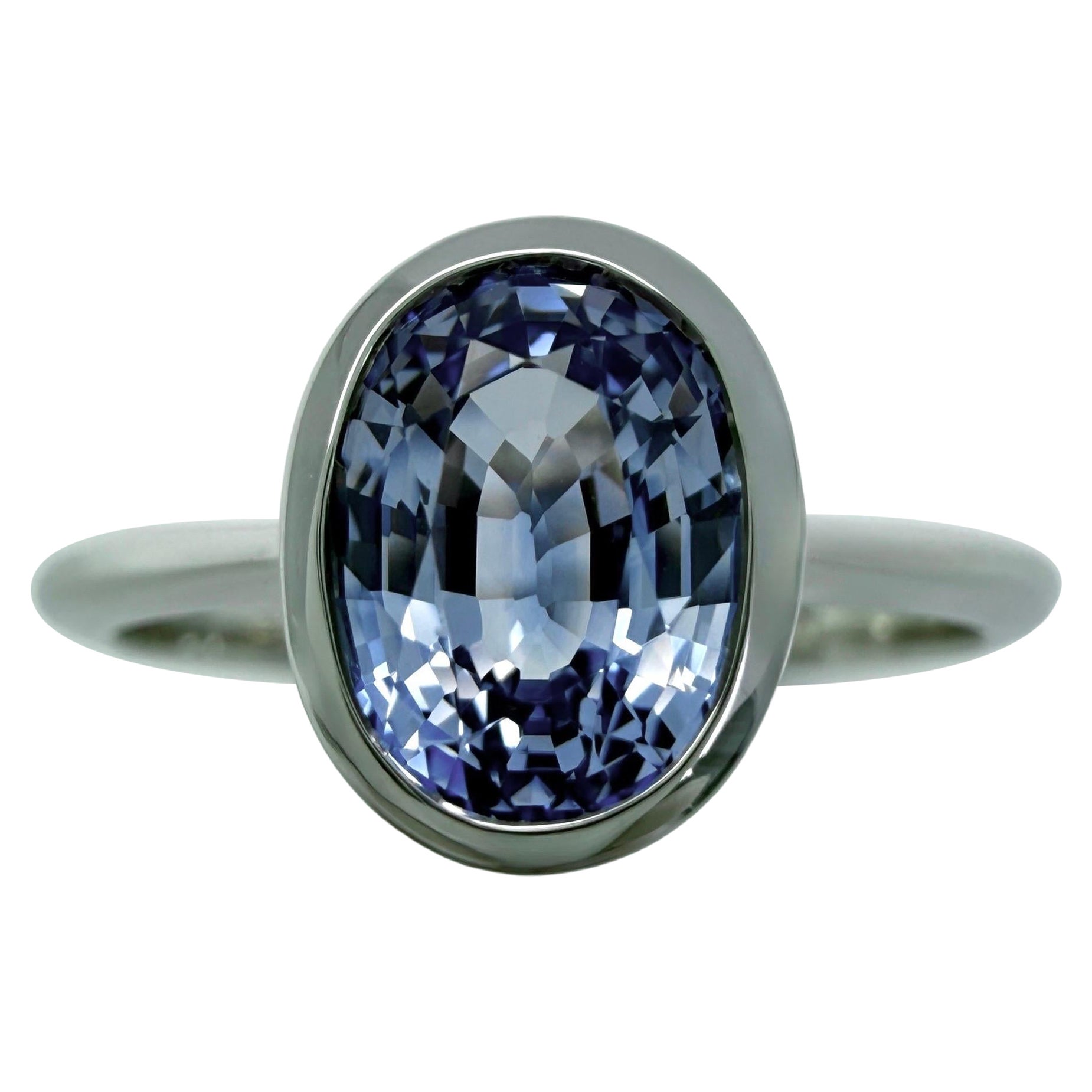 1.03ct Vivid Light Blue Ceylon Sapphire Oval 950 Platinum Solitaire Bezel Ring