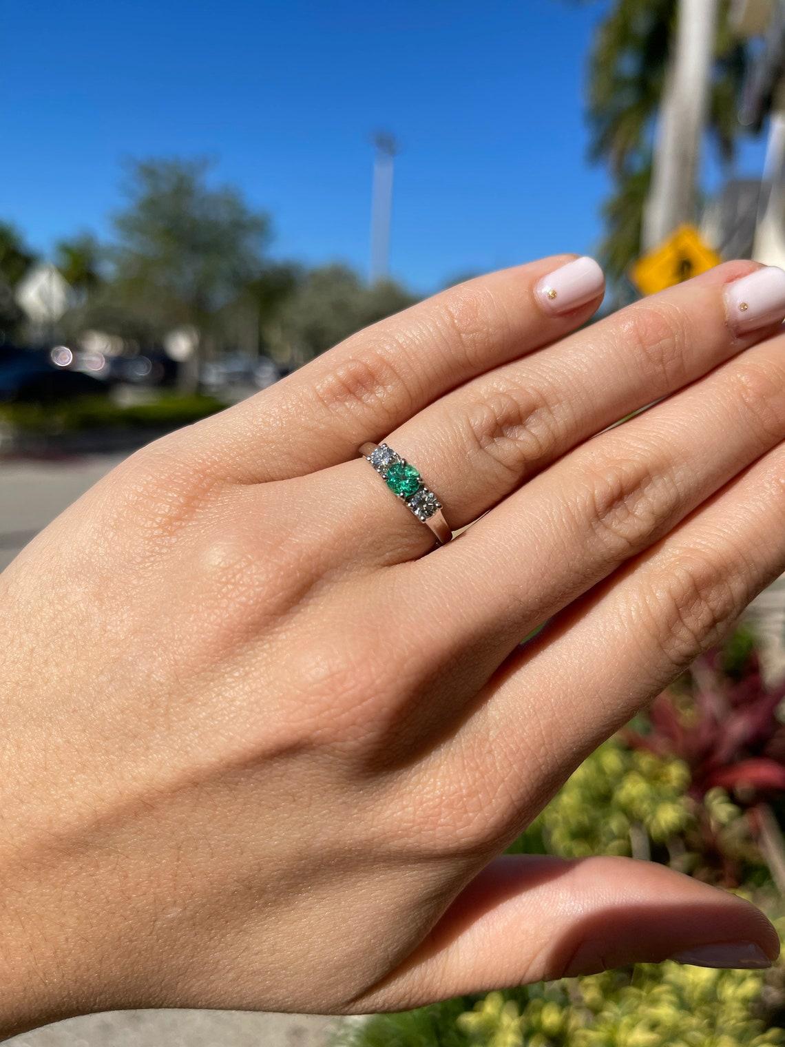 diamond ring with emeralds