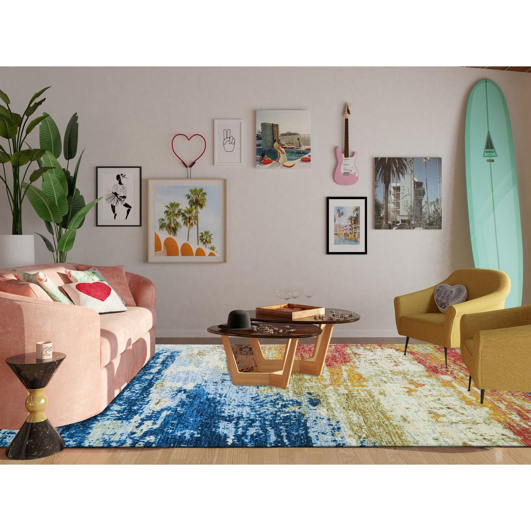 Chiffon Ivory, Colorful Modern Abstract Design, 100% Wool, Hand Knotted, Lush Pile, Oriental Rug
Primary materials: Wool
Latex: No Pile 
height: 0.25 Inches
Style: Contemporary
Primary color: Ivory
Secondary colors: Denim Blue, Light Blue, Brown,