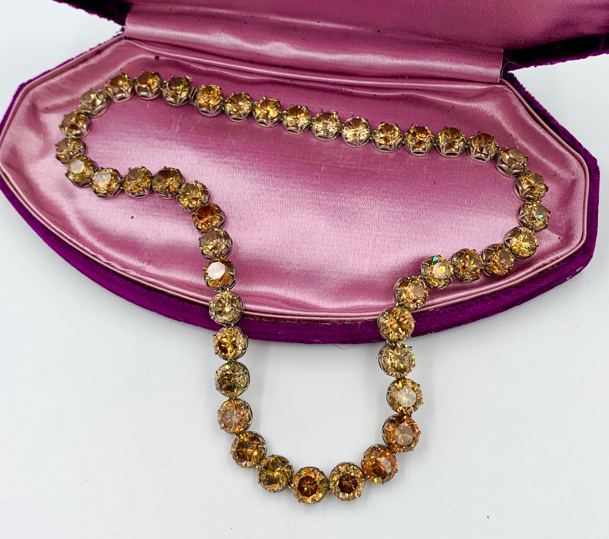 One of the finest Victorian to Art Deco Golden Zircon Parure with Necklace and Earrings that we have ever seen.  Antique natural mined Golden Zircon gems are very rare.  Here we have 104 Carats of them and they are absolutely stunning with