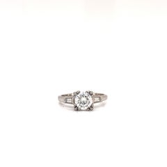1.04 Carat Brilliant Round Cut Diamond GSI2 with Two Baguettes