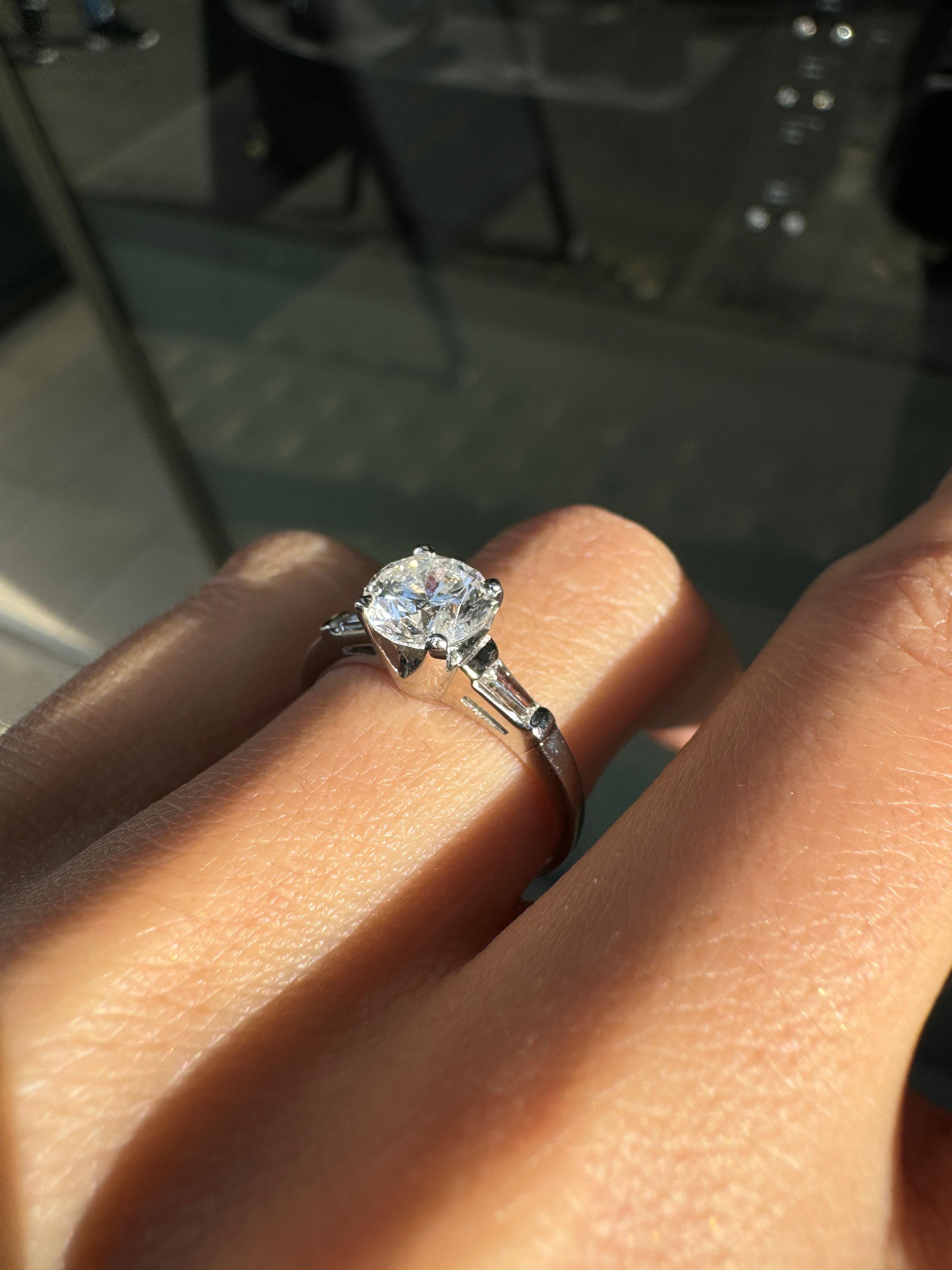 1.04 Carat Diamond and Platinum Three Stone Engagement Ring For Sale 1
