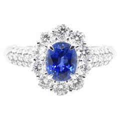 1.04 Carat Natural Blue Sapphire and Diamond Halo Ring Set in Platinum