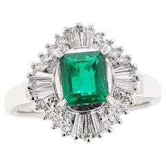 Vintage 1.04 Carat Natural Emerald Step-Cut Emerald Ring with 0.54 Carat of Diamonds