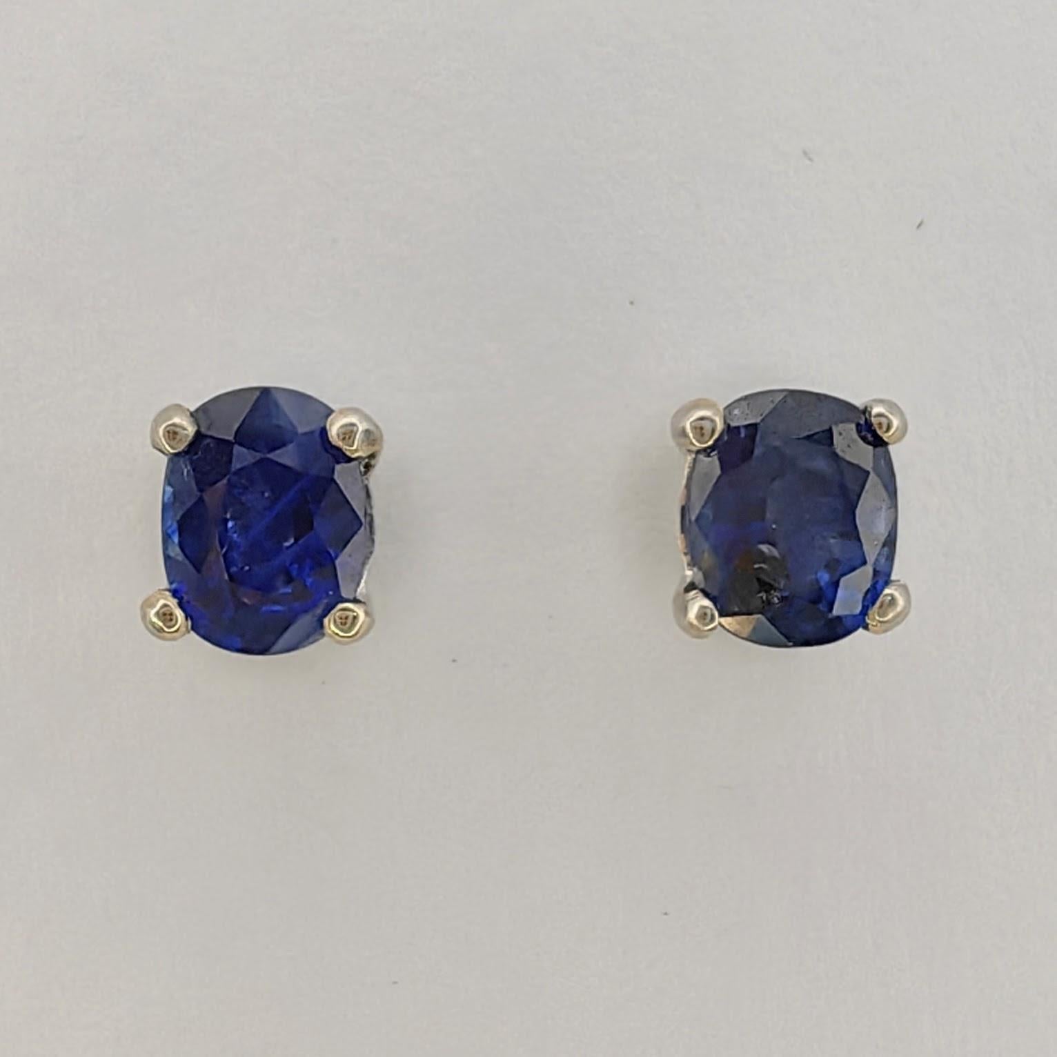 Introducing our 1.04 Carat Oval-cut Sapphire Four Prong Stud Earrings in 18K White Gold, an essential addition to your jewelry collection.

These exquisite earrings feature two oval-cut sapphires, with a total weight of 1.04 carats. Their deep and