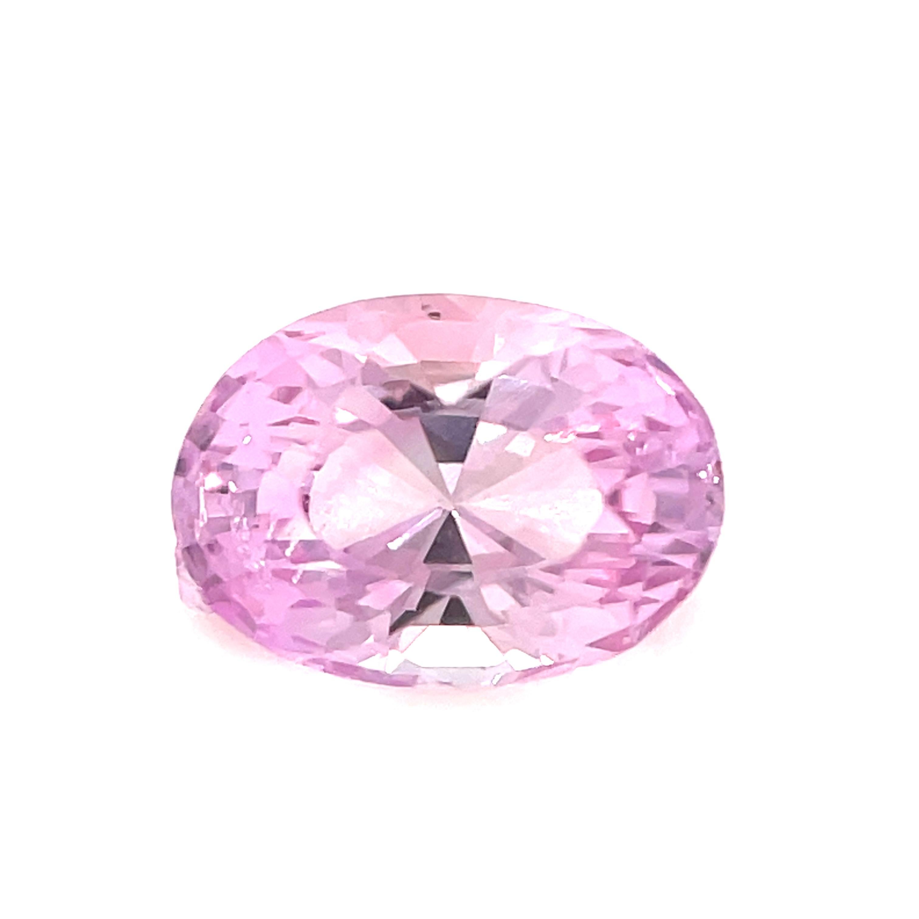 This sparkling cherry blossom pink sapphire will make a gorgeous ring or pendant! Weighing 1.04 carat and measuring 6.83 x 4.83 millimeters, it is a beautiful and affordable center stone that would look gorgeous set with diamonds or other colored