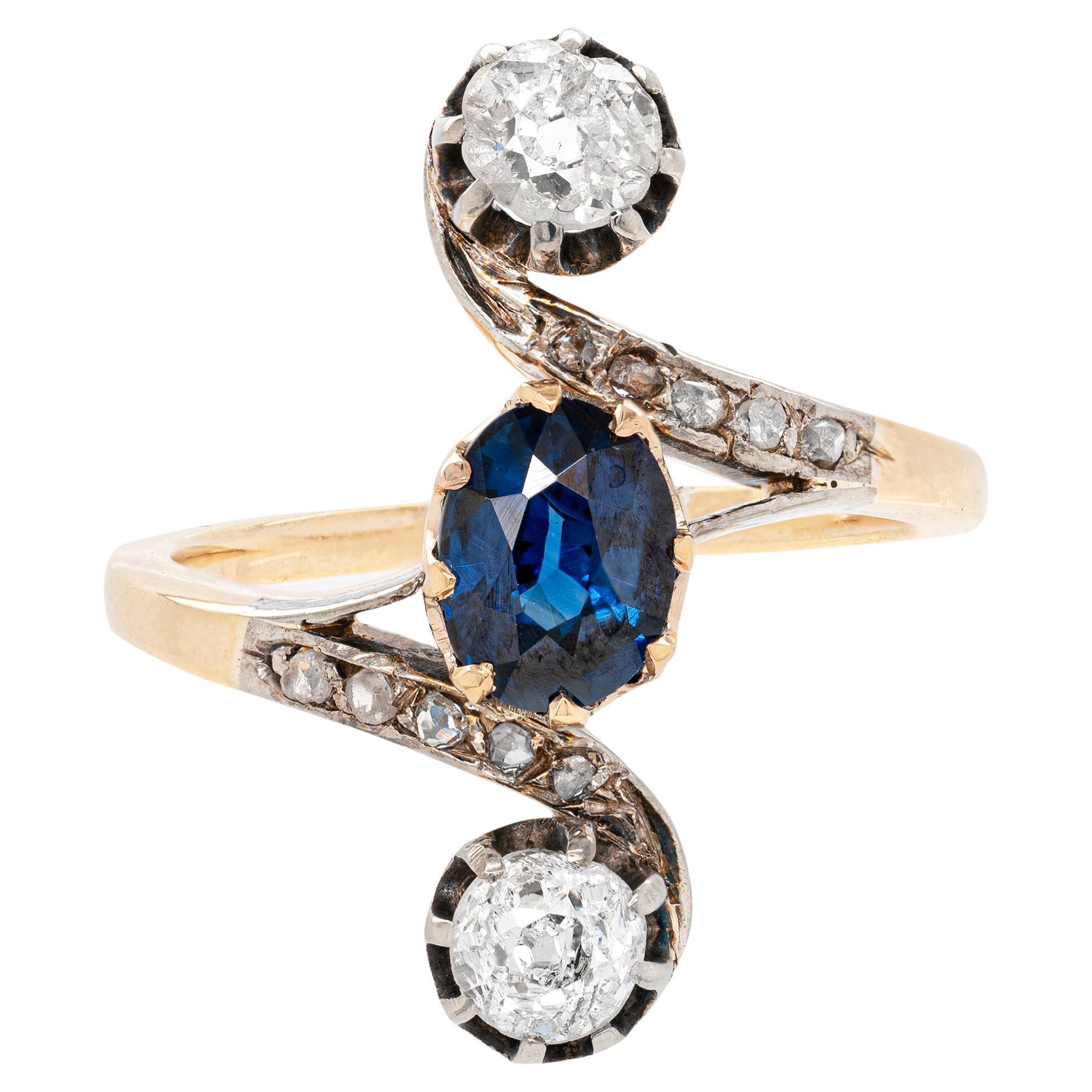 1.04 Carat Oval Sapphire and Old Mine Cut Diamond Three-Stone Ring, circa 1890 For Sale