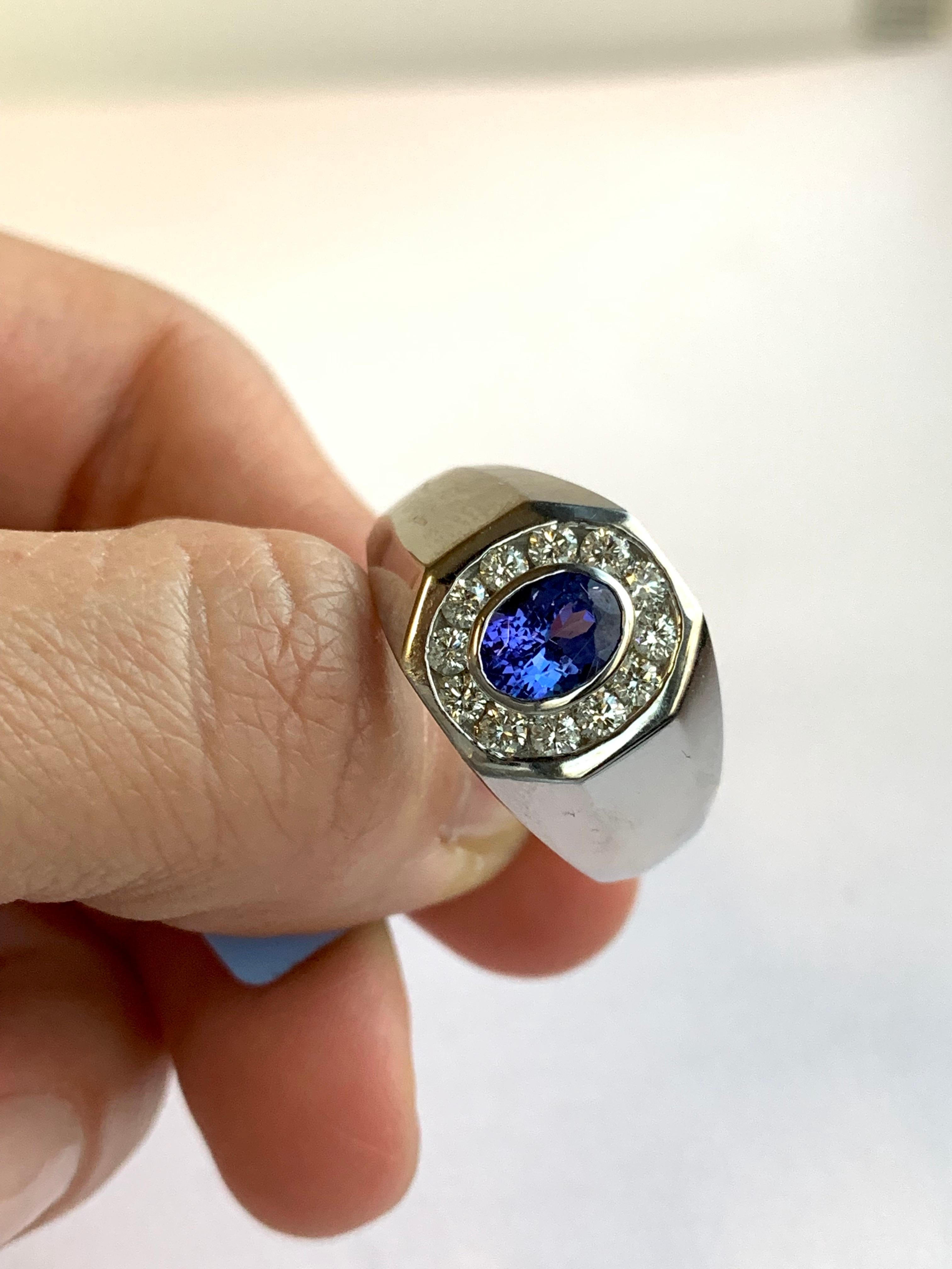 Material: 14k White Gold
Gemstones: 1 Oval Tanzanite at 1.04 Carats Measuring 7 x 5 mm
Diamonds: 12 Brilliant Round White Diamonds at 0.50 Carats. SI Clarity / H-I Color. 
Ring Size: 10. Alberto offers complimentary sizing on all rings.

Fine