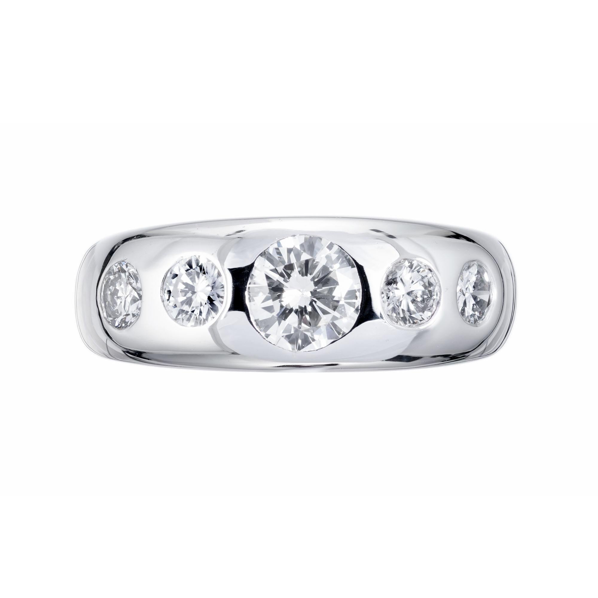 Handmade diamond gypsy style ring. Platinum setting with 5 round brilliant cut tapered flush set diamonds.

1 round brilliant cut diamond G SI, approx. .50cts
4 round brilliant cut diamonds G-H VS-SI, approx. .54cts
Size 6.5 and sizable +/- one