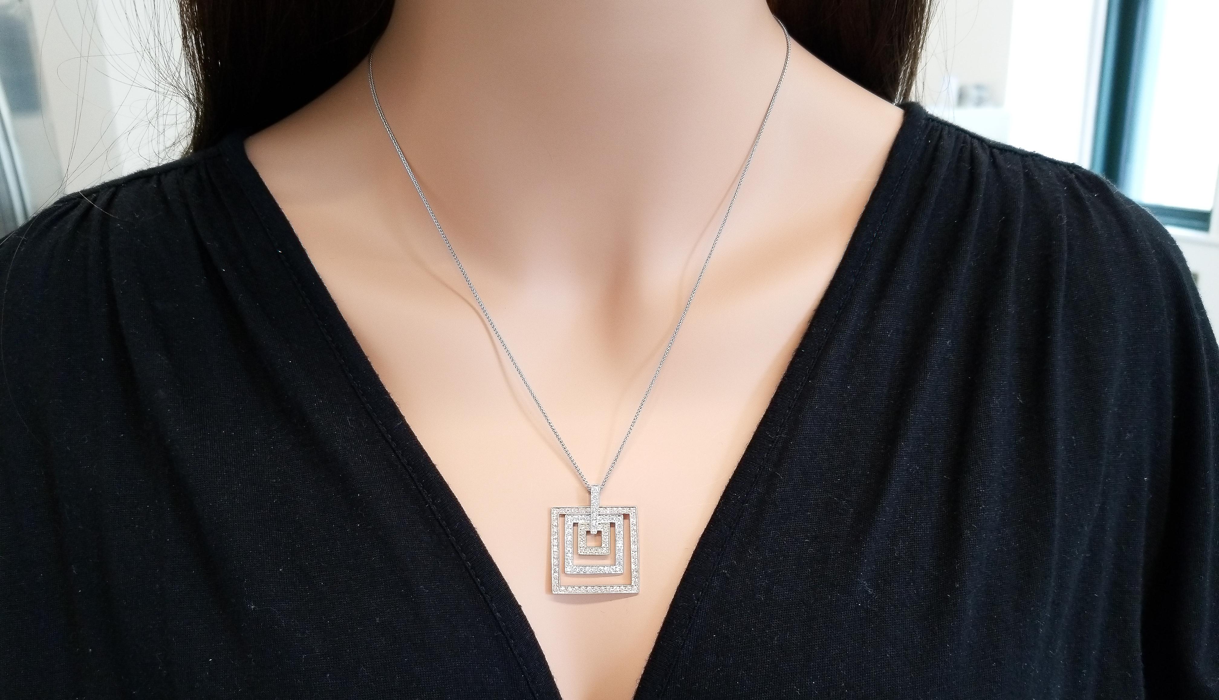 This is a pendant with a trio of color and a celebration of form. This beautiful concentric-design features 1.04 carats of brilliant diamonds that decorate the nested squares of this elegant pendant. An outer frame of 14k rose gold surrounds another