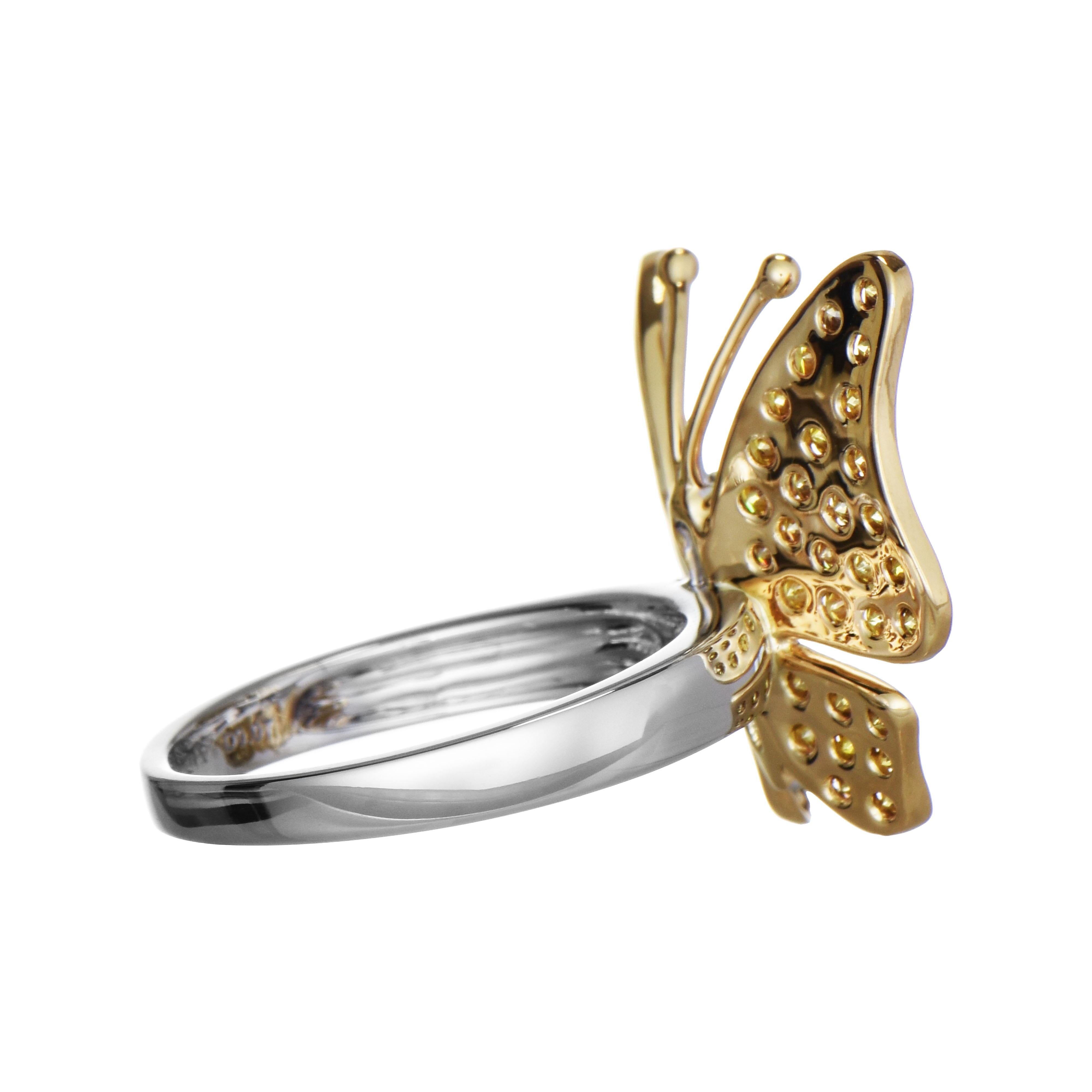 64 Yellow Diamonds: 0.97 Carat
6 White Diamonds: 0.07 Carat
Metal: 18K White and Yellow Gold, 6.20 Grams