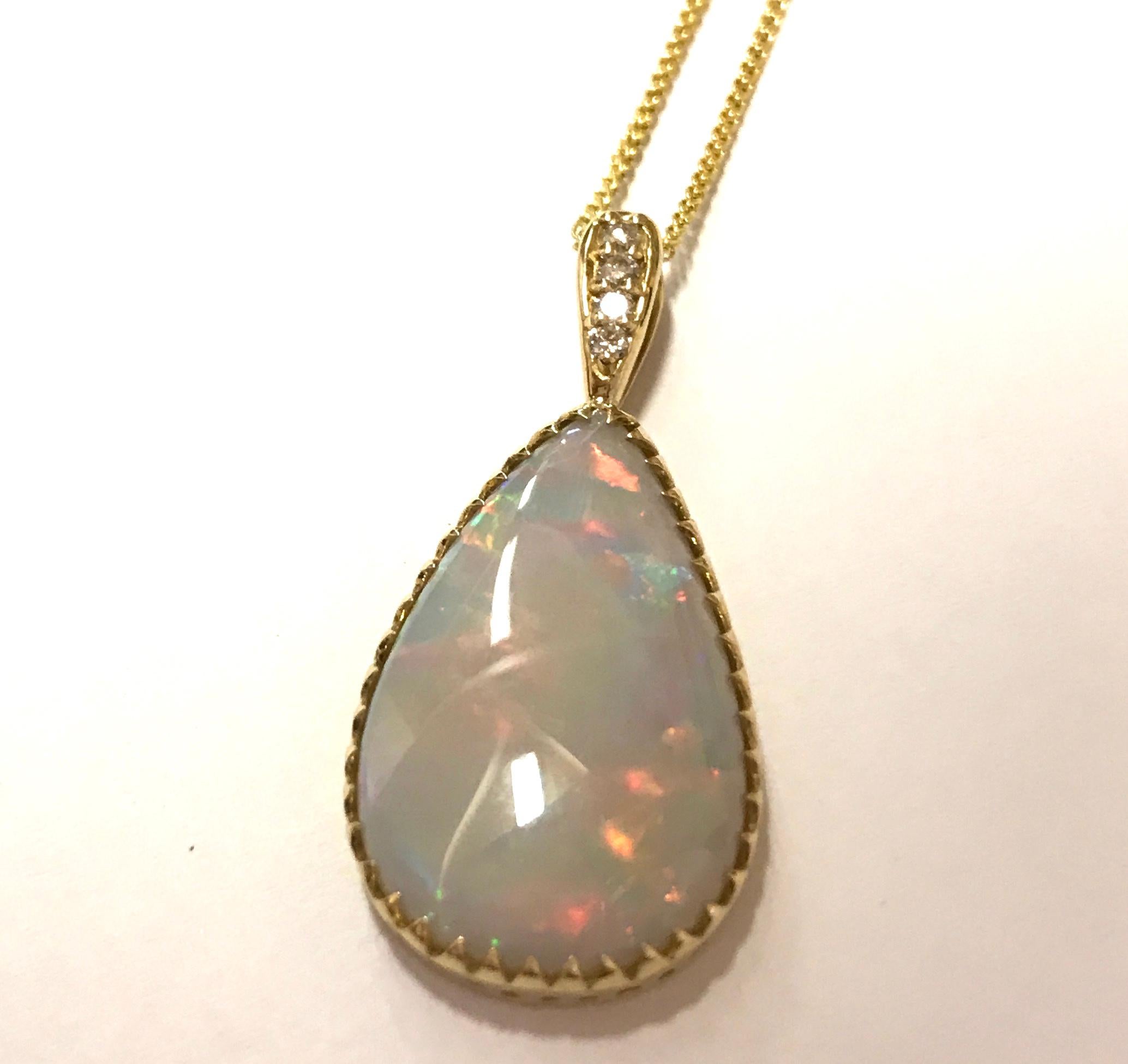 Pear Cut 10.40 Carat Pear Shape Opal and Diamond Pendant