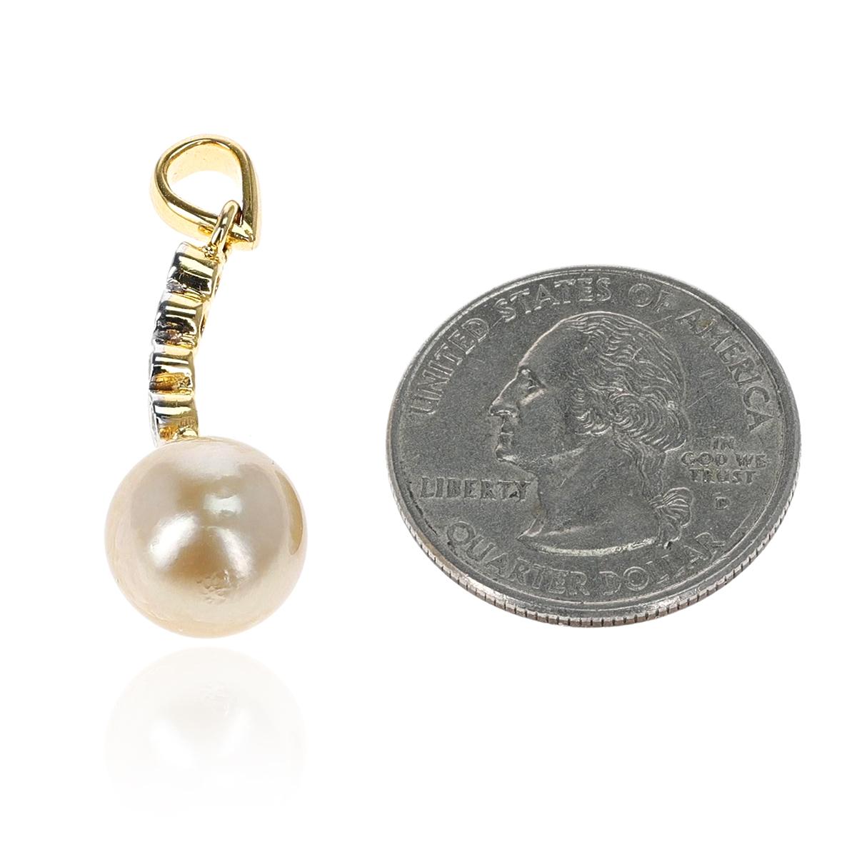 A South Sea Pearl and Diamond Pendant made in 14K Gold. The total weight of the pendant is 3.90 grams. The weight of the pearl is 10.40 carats and the total weight of the diamonds is 0.25 carats. Chain not included. Chain of choice can be added on