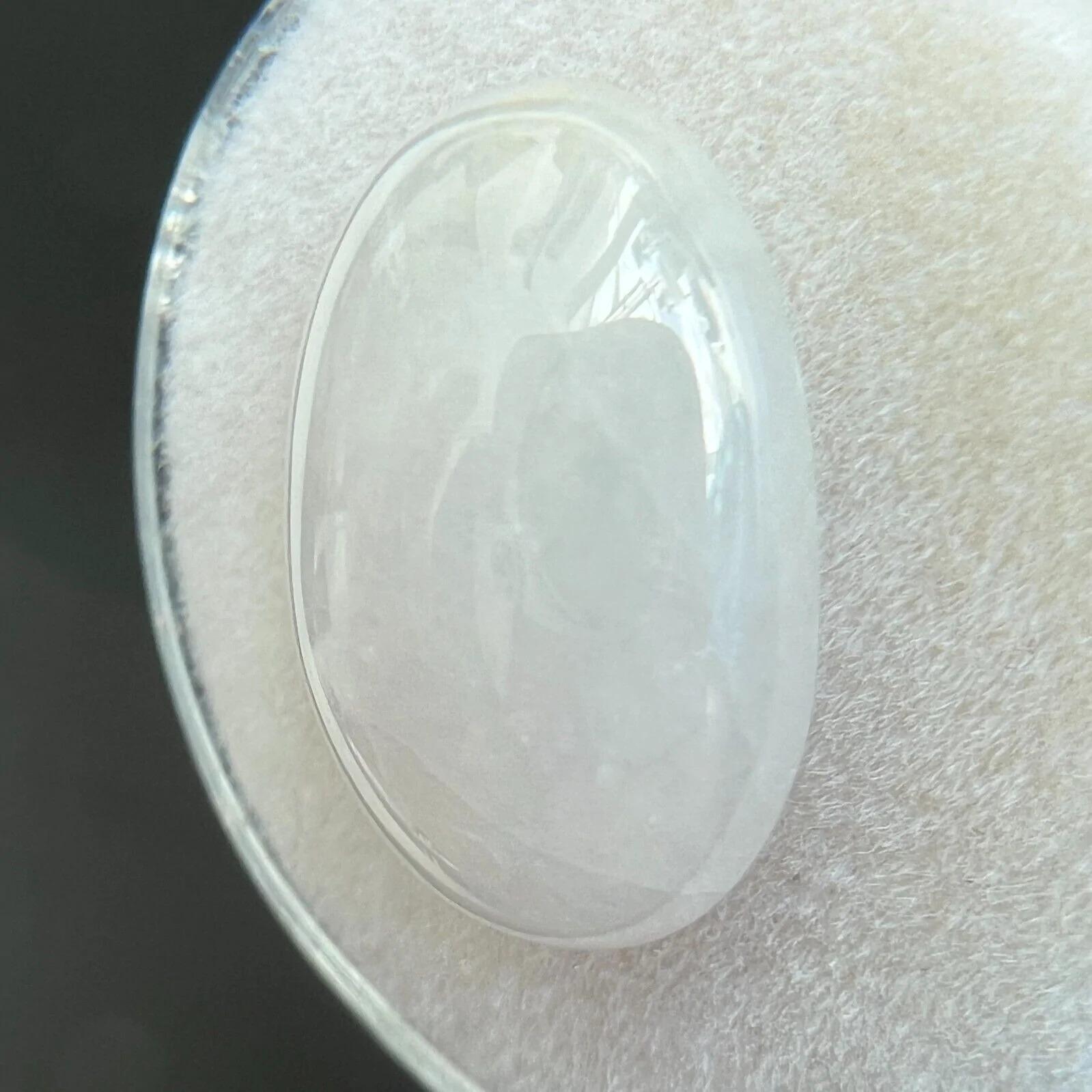 10.43ct GIA Certified White 'Ice' Jadeite Jade ‘A’ Grade Oval Cabochon Untreated

GIA Certified Untreated White Jadeite Gemstone. 
10.43 Carat with an excellent oval cabochon cut. Fully certified by GIA. Totally Untreated Jadeite jade, referred to