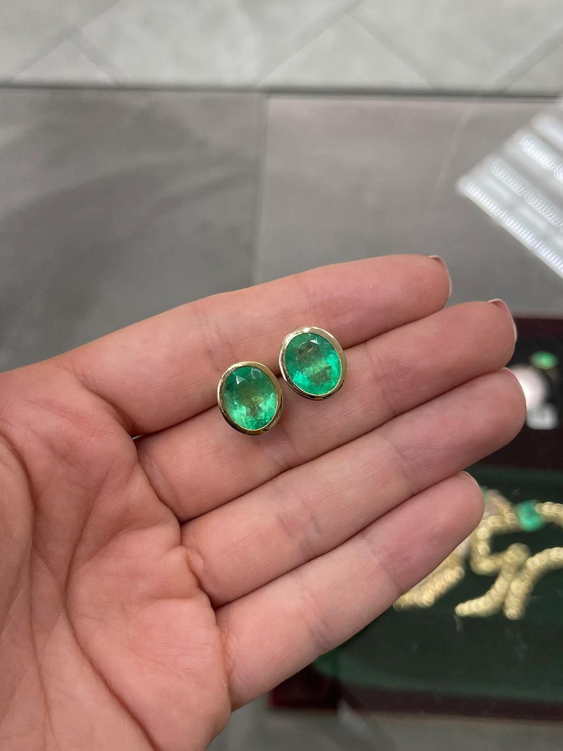 Modern 10.45tcw 14K Huge Colombian Emerald-Oval Cut Bezel Set Yellow Gold Stud Earrings For Sale
