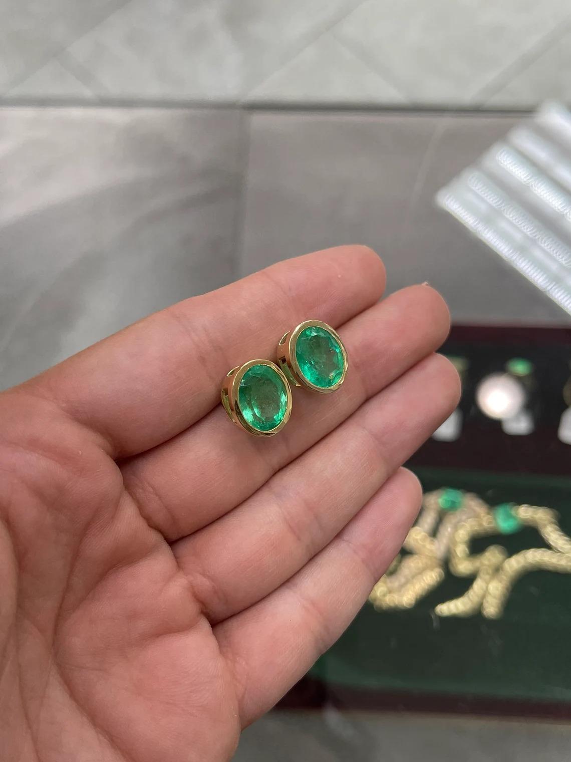 10.45tcw 14K Huge Colombian Emerald-Oval Cut Bezel Set Yellow Gold Stud Earrings In New Condition For Sale In Jupiter, FL