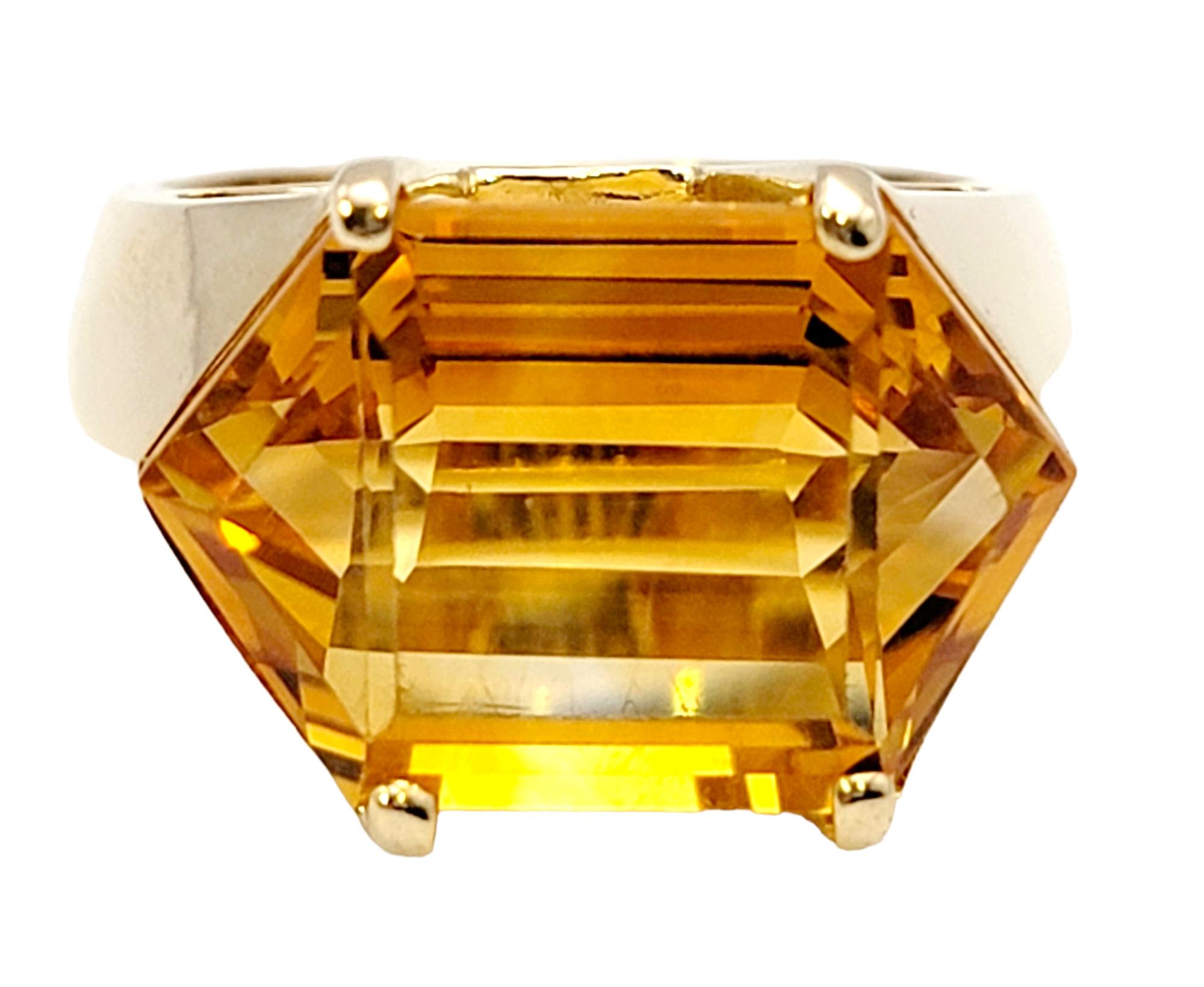 Ring size: 6.75

This contemporary citrine cocktail ring will make your finger absolutely glow. This chic, modern piece makes a sophisticated statement with its unique shape and rich, warm color. The incredible hexagonal cut citrine stone is 4 prong