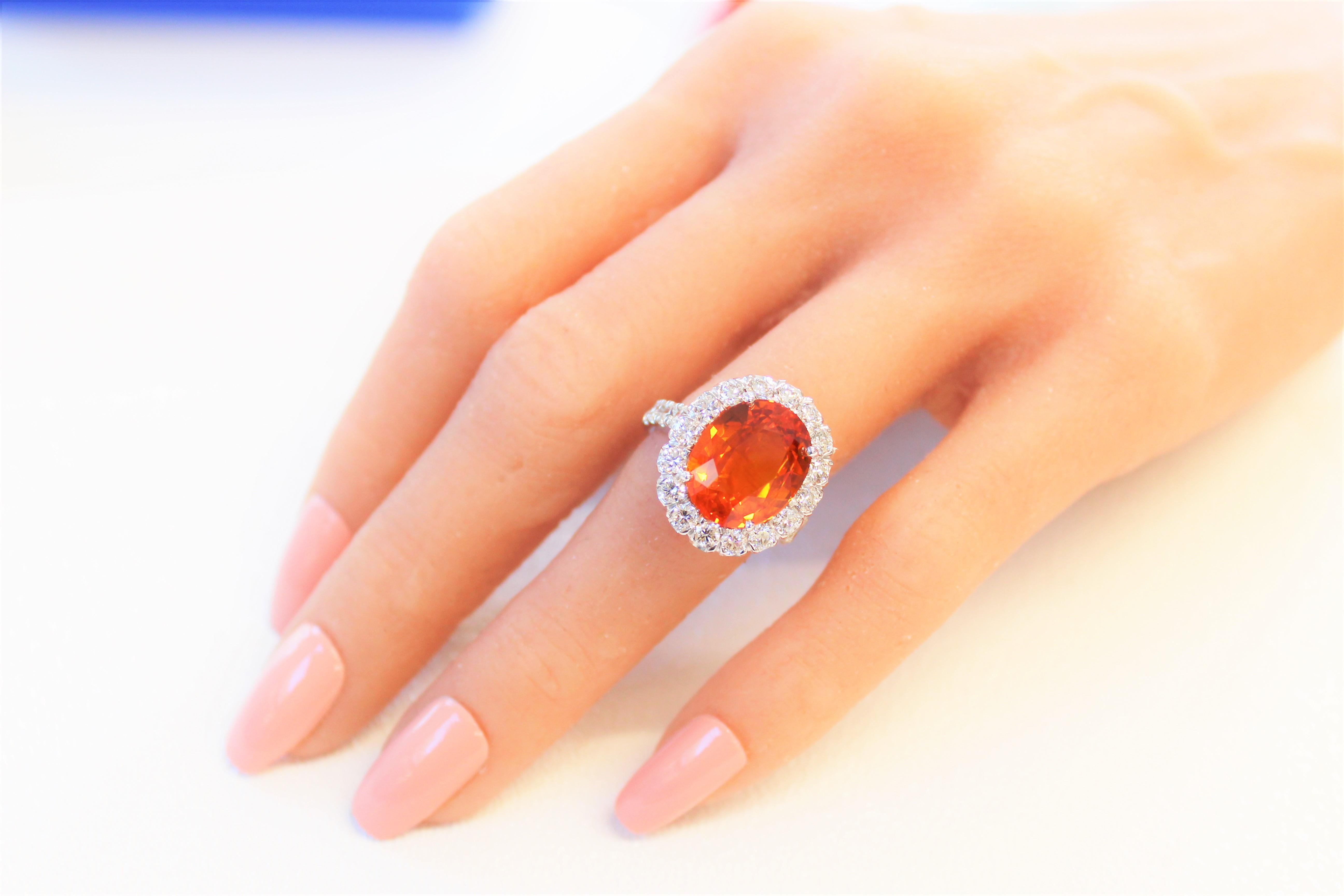 Cushion Cut 10.47 Carat Oval Orange Sapphire and Diamond Ring in 18K White Gold For Sale