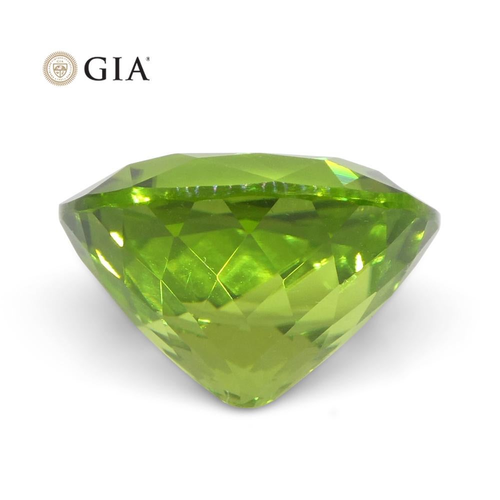 Péridot ovale vert jauneâtre 10,47 carats certifié GIA en vente 7