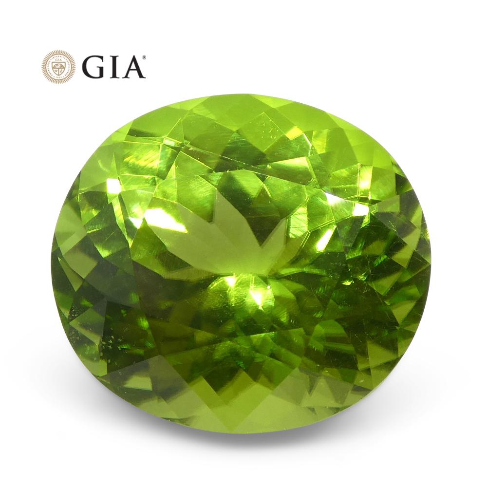 Brilliant Cut 10.47ct Oval Yellowish Green Peridot GIA Certified For Sale