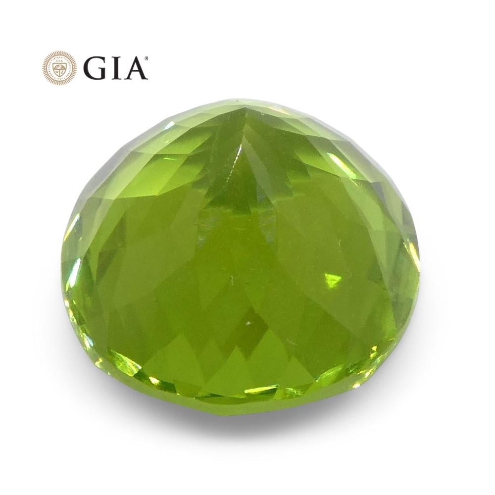 Women's or Men's 10.47ct Oval Yellowish Green Peridot GIA Certified For Sale