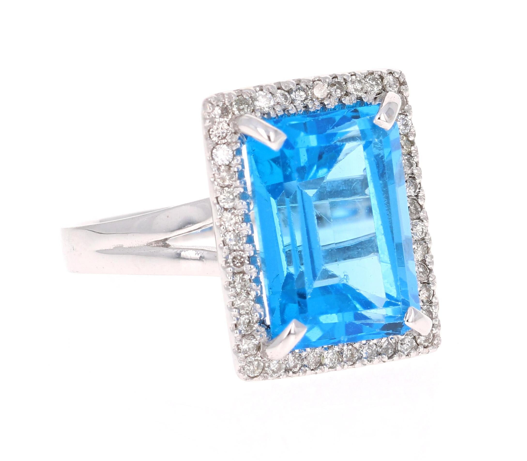 This beautiful Emerald Cut Blue Topaz and Diamond ring has a stunningly large Blue Topaz that weighs 10.05 Carats. It is surrounded by 43 Round Cut Diamonds that weigh 0.43 Carats. The total carat weight of the ring is 10.48 Carats. 

The Gigantic