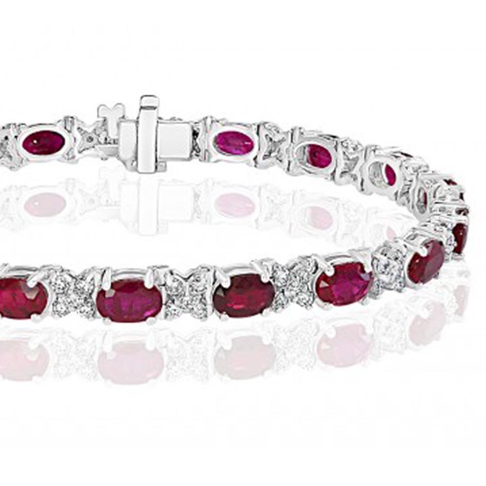 Oval Cut 10.48 Carat Ruby Bracelet with 1.05 Carat of Diamonds Set in 18 Karat White Gold For Sale