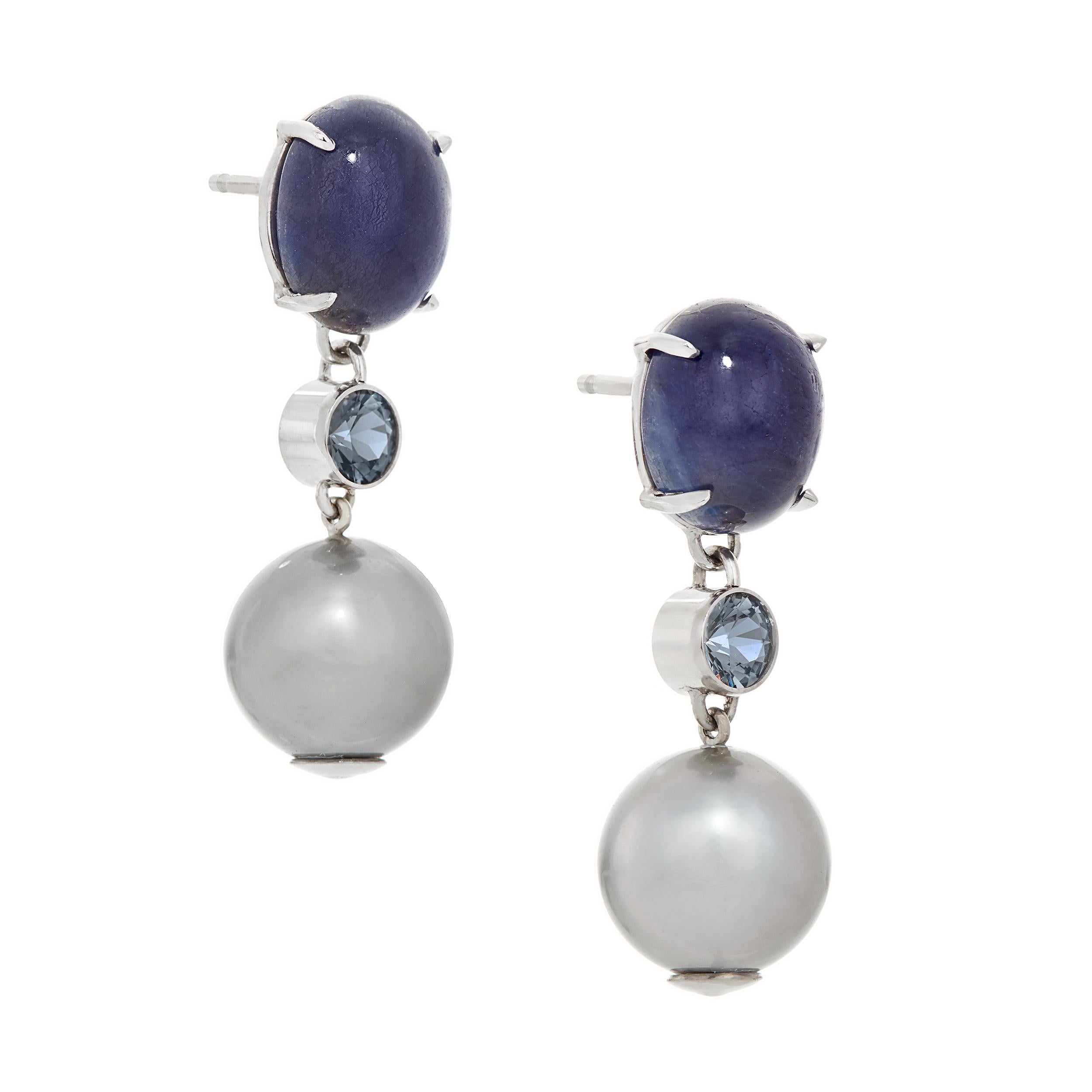 These earrings were designed alongside a coordinating necklace that can be found on a separate listing.  The designer loved the cool tones of these matched Gray Tahitian Pearls complimented by Blue Sapphires and Lavender Spinel.

Gemstone Detail
2