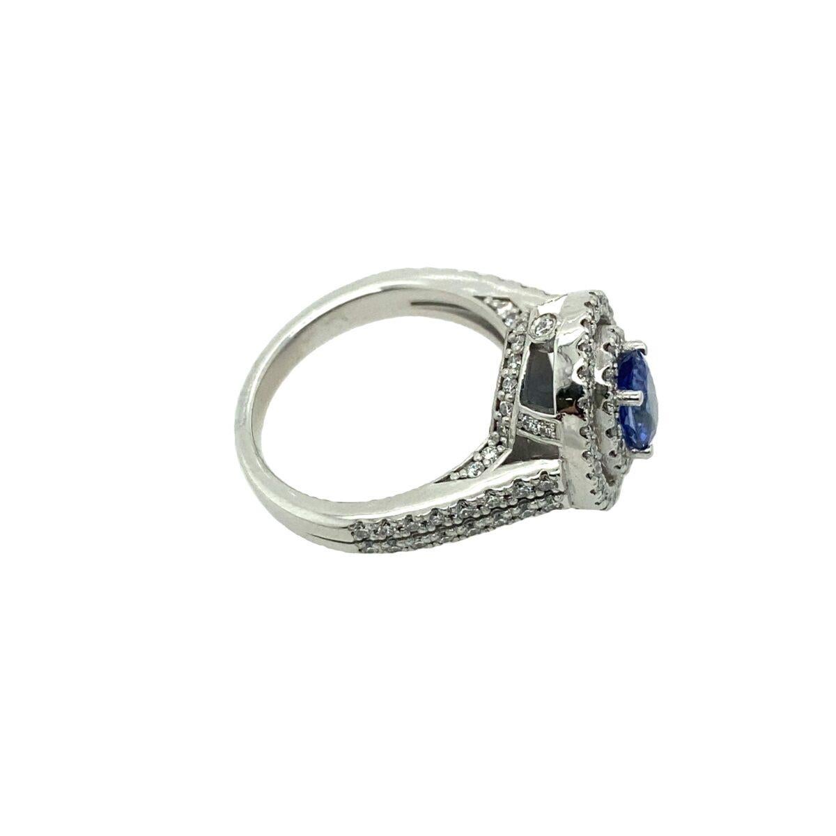 diamond ring surrounded by sapphires