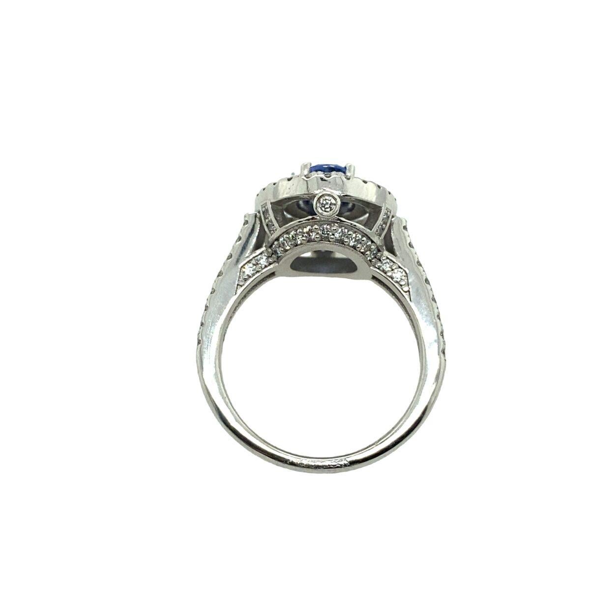 Brilliant Cut 1.04ct Certified Natural Ceylon Sapphire Ring Surrounded by 0.87ct Diamonds For Sale