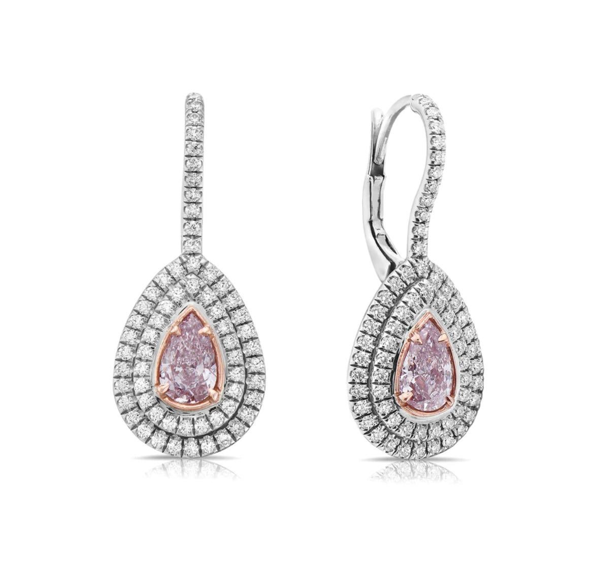 - 0.52ct & 0.52ct Faint / Light Pink SI1 Pear Shapes GIA
- Sweet colors.
- Set in 18kt WG and Rose Gold with 124pc 0.64ct of white diamonds
