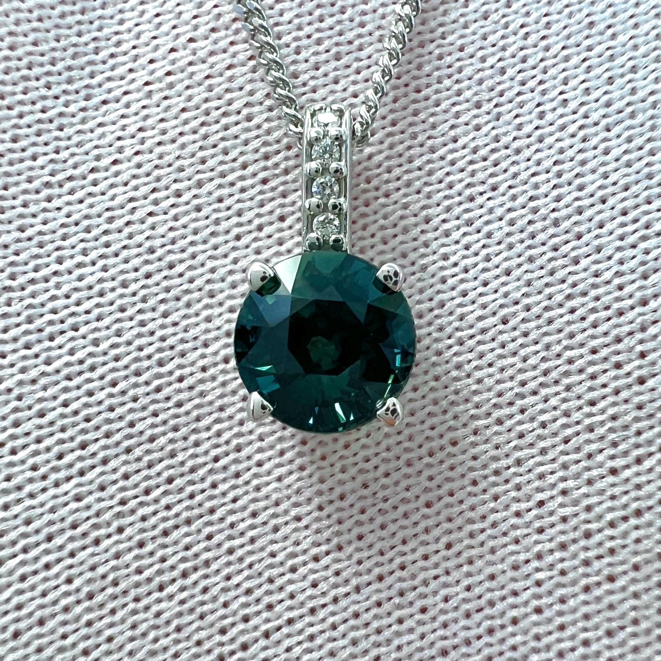 IGI Certified Untreated Green-Blue Teal Sapphire & Diamond 18k White Gold Pendant.

1.04 Carat sapphire with fine deep green blue 'teal' colour and very good clarity, VS. Also has an excellent round cut which displays the fine colour to best