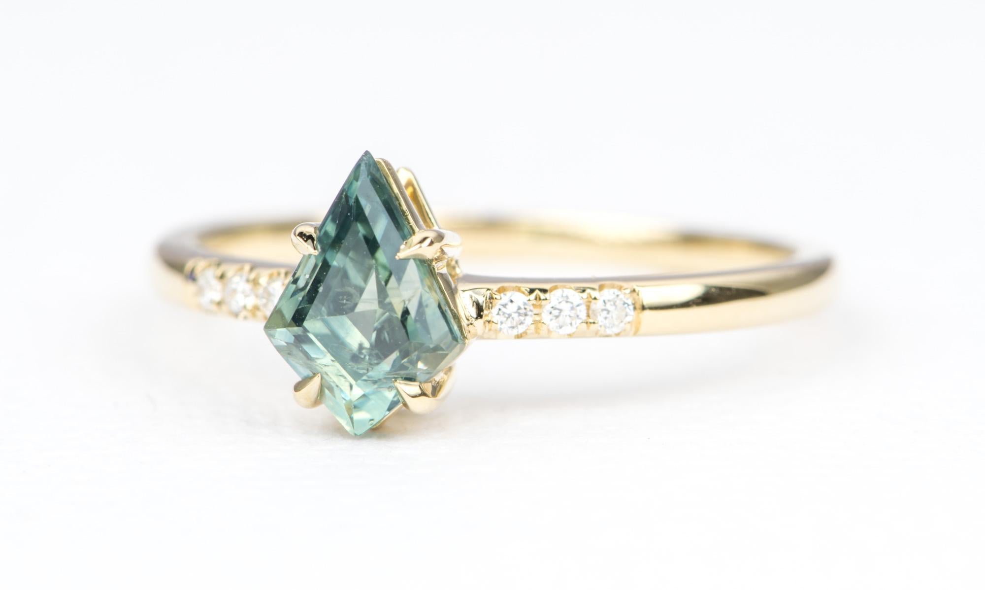 teal sapphire wedding band