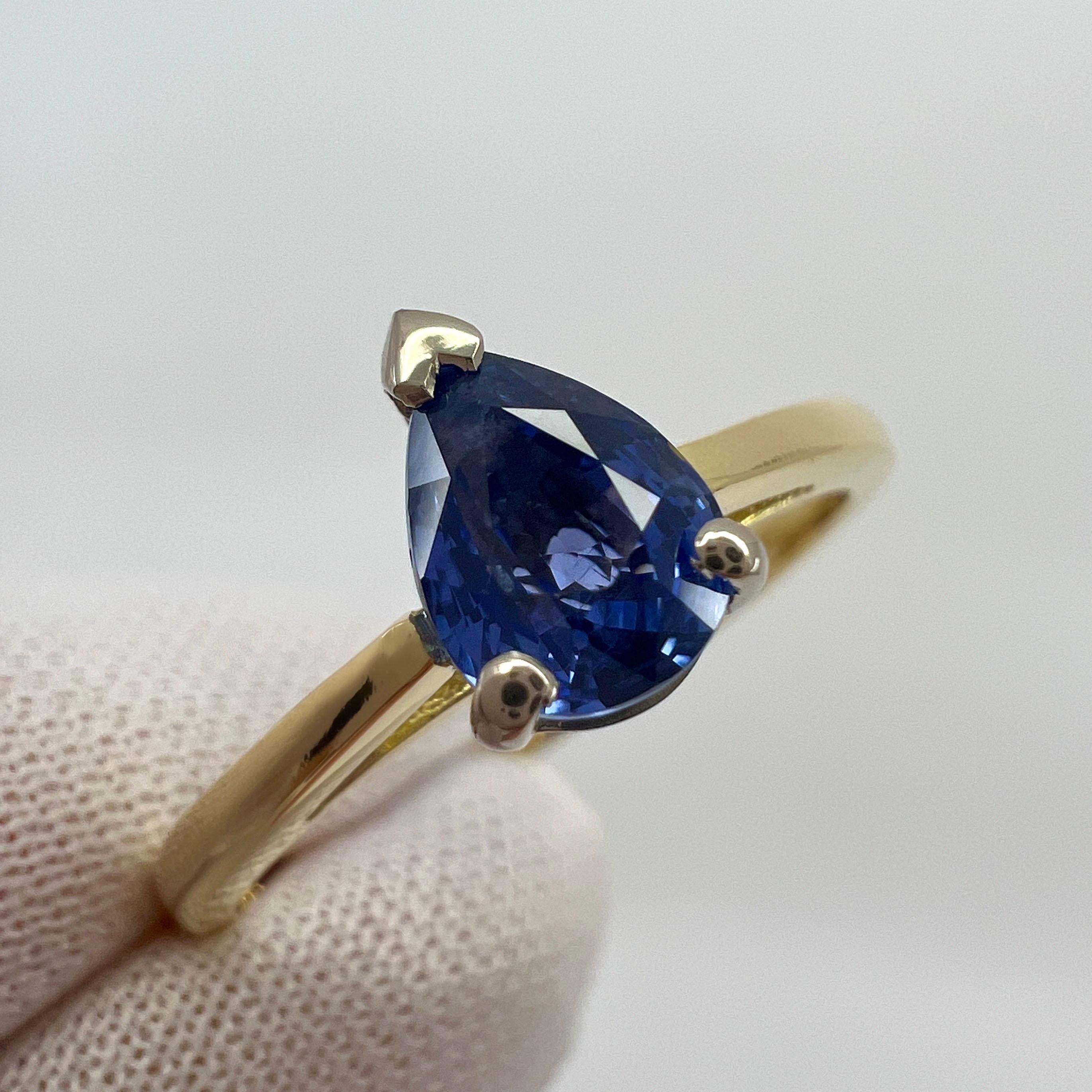 Vivid Blue Ceylon Sapphire Pear Cut 18k Yellow & White Gold Solitaire Ring.

1.04 Carat sapphire with a stunning vivid blue colour and good clarity. Clean stone with only some small natural inclusions visible when looking closely.

Also has a very